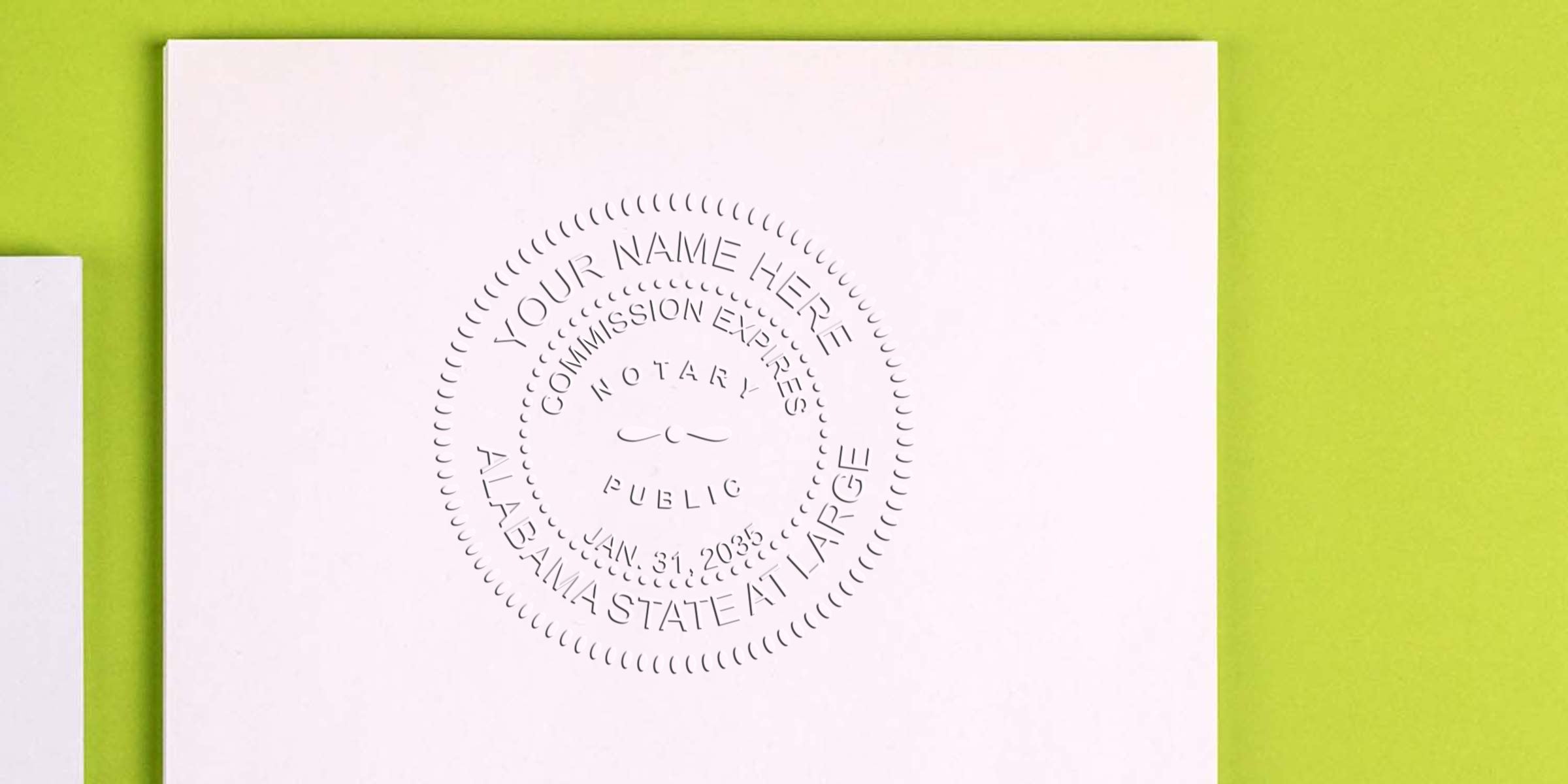 Alabama notary public embossed seal on white paper, with Alabama notary stamp and self-inking stamp for official legal documents.