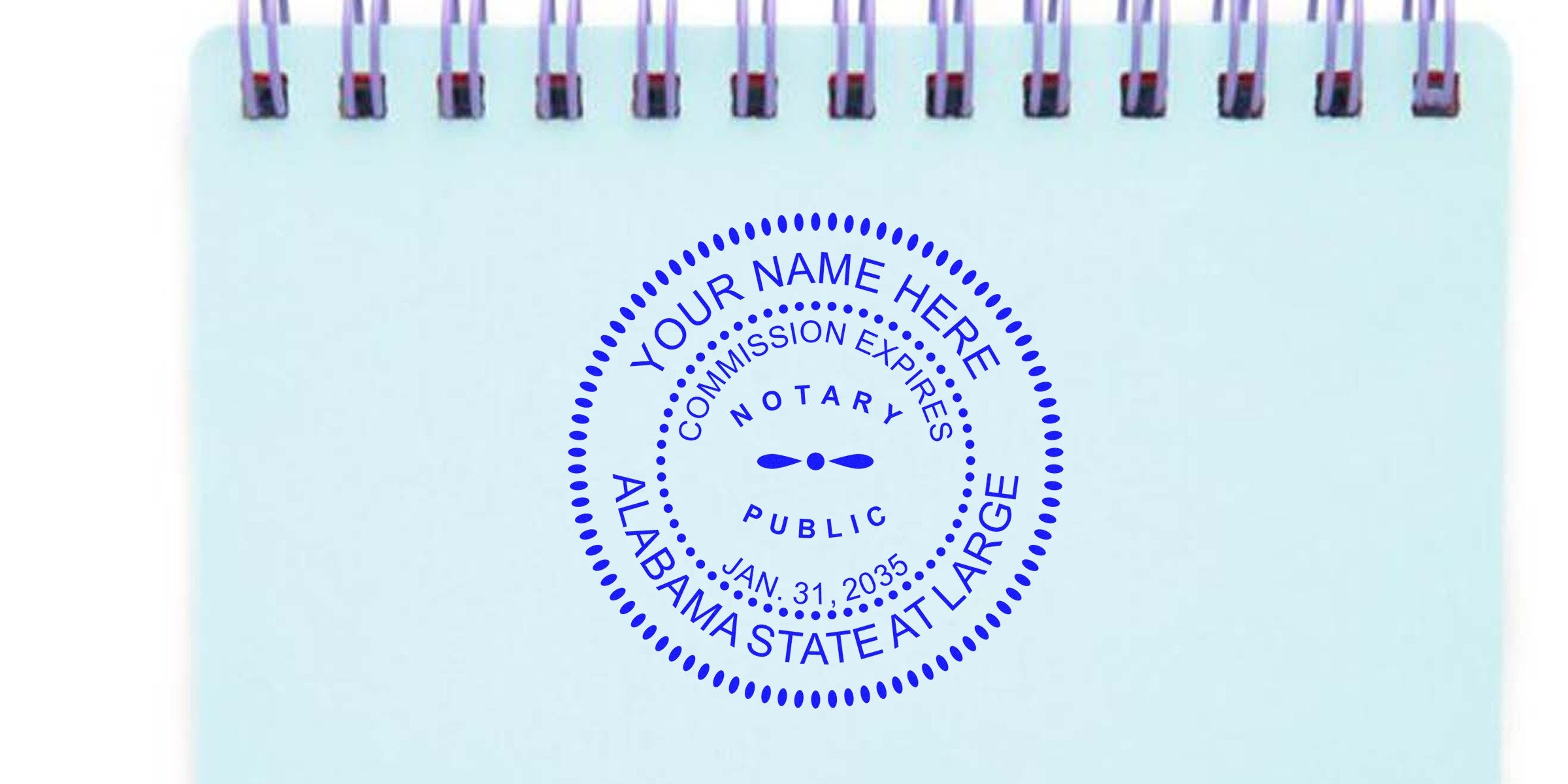 Alabama notary public seal stamp with commission expiration date on a spiral notebook page, displaying AL notary stamps and various stamp options.