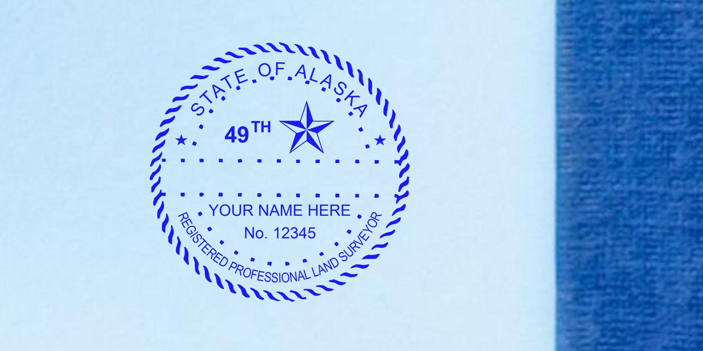 Alaska land surveyor stamp with a blue embossed seal on a document, emphasizing the stamp's role in professional validation.