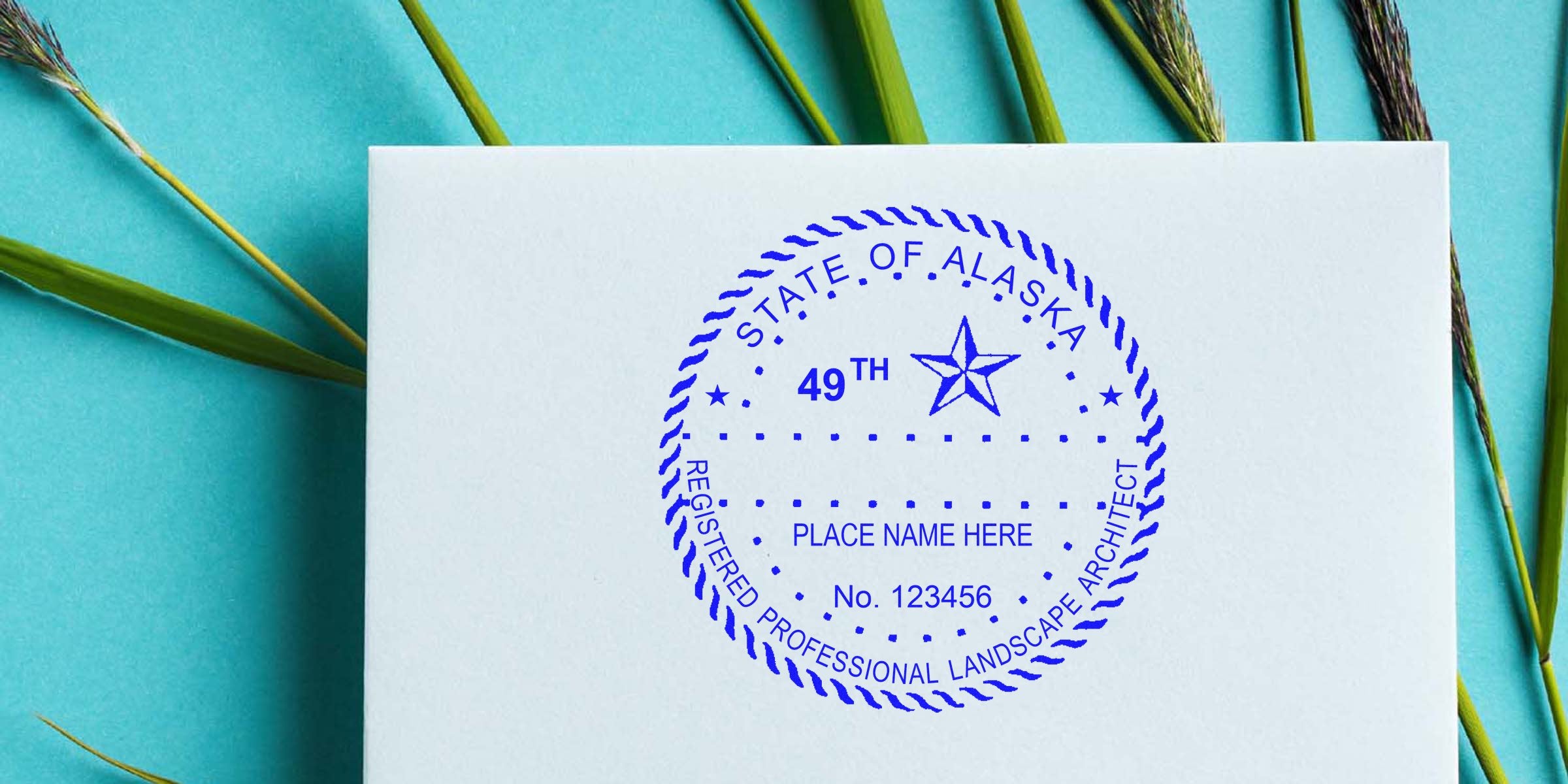 Alaska registered landscape architect seal on white paper with natural grass background, showing the stamp and steps to order a landscape architect seal.