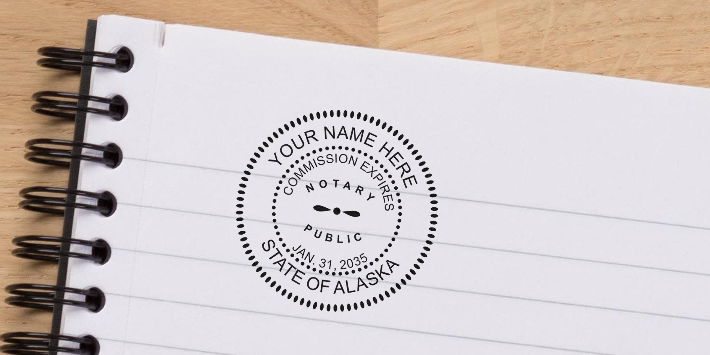 Alaska notary stamp on notebook paper with official seal and commission expiration date January 31, 2035.