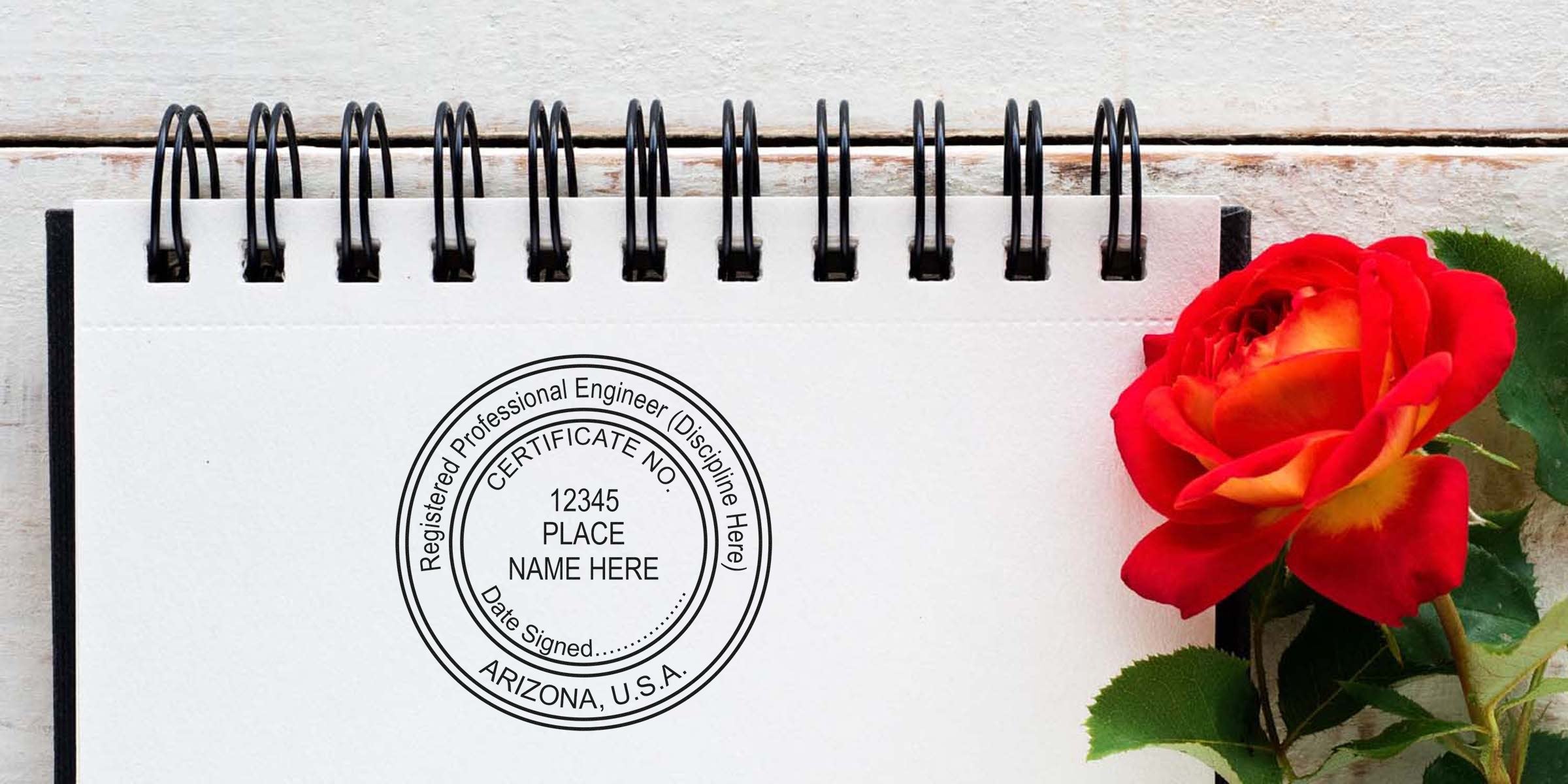 Registered Professional Engineer seal on notebook with red rose, showcasing Arizona engineer stamps from Engineer Seal Store, certified professional engineer in Arizona, USA.