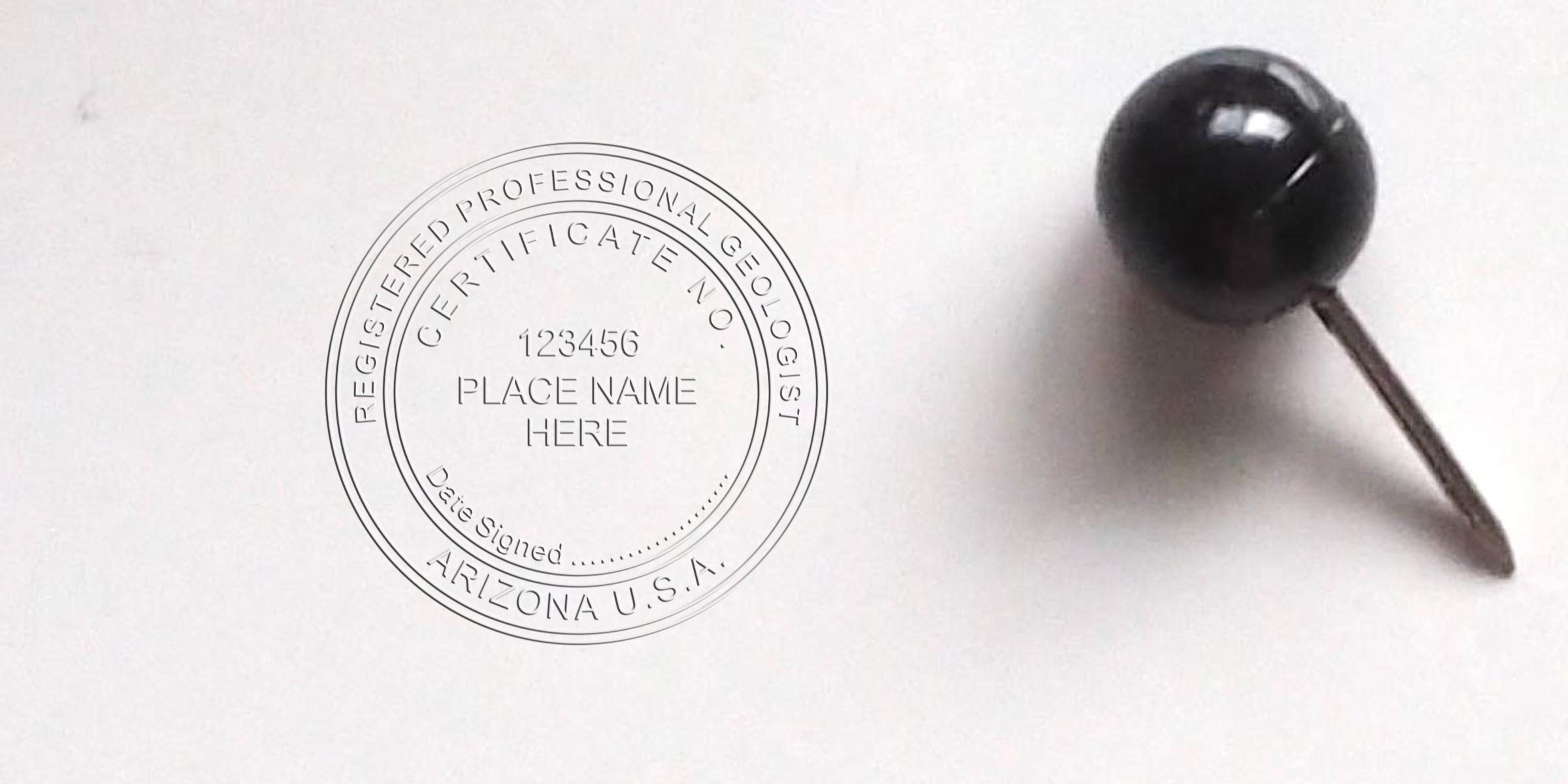 Registered professional geologist certification stamp with black push pin on white background, Arizona geologist license renewal, geologist stamp renewal Arizona.