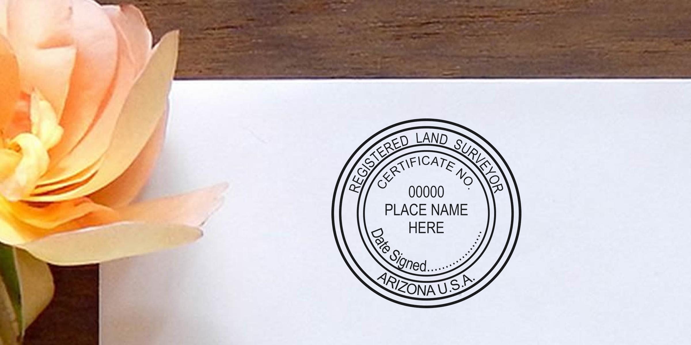 Arizona land surveyor stamp on white paper with orange flower, showing a custom survey stamp and Arizona USA certification seal for expert land surveying services.