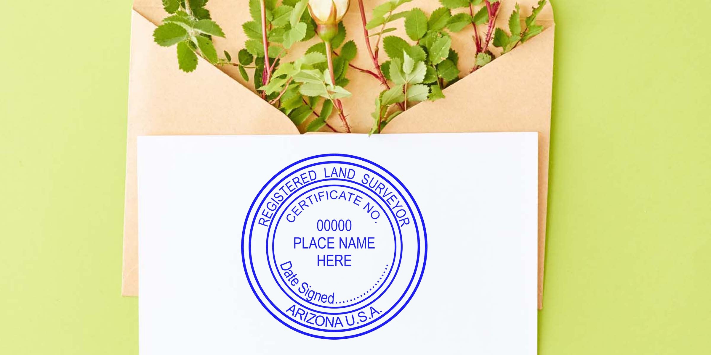 Arizona land surveyor stamp on white paper with envelope and green leaves, meeting official land survey certification requirements in Arizona, USA.