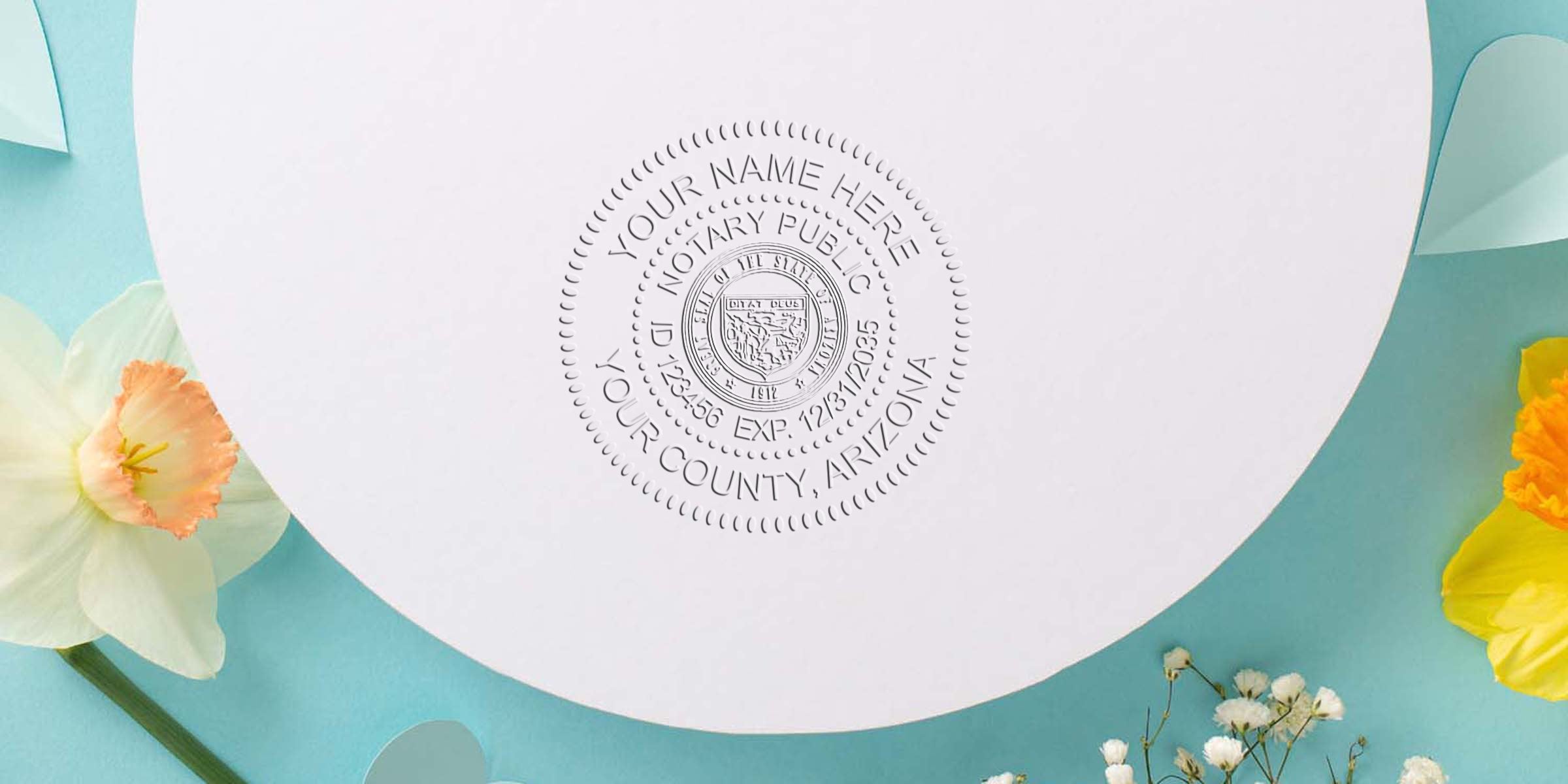 Arizona notary seal embossed on white paper with flowers against a blue background, meeting all notary seal requirements.