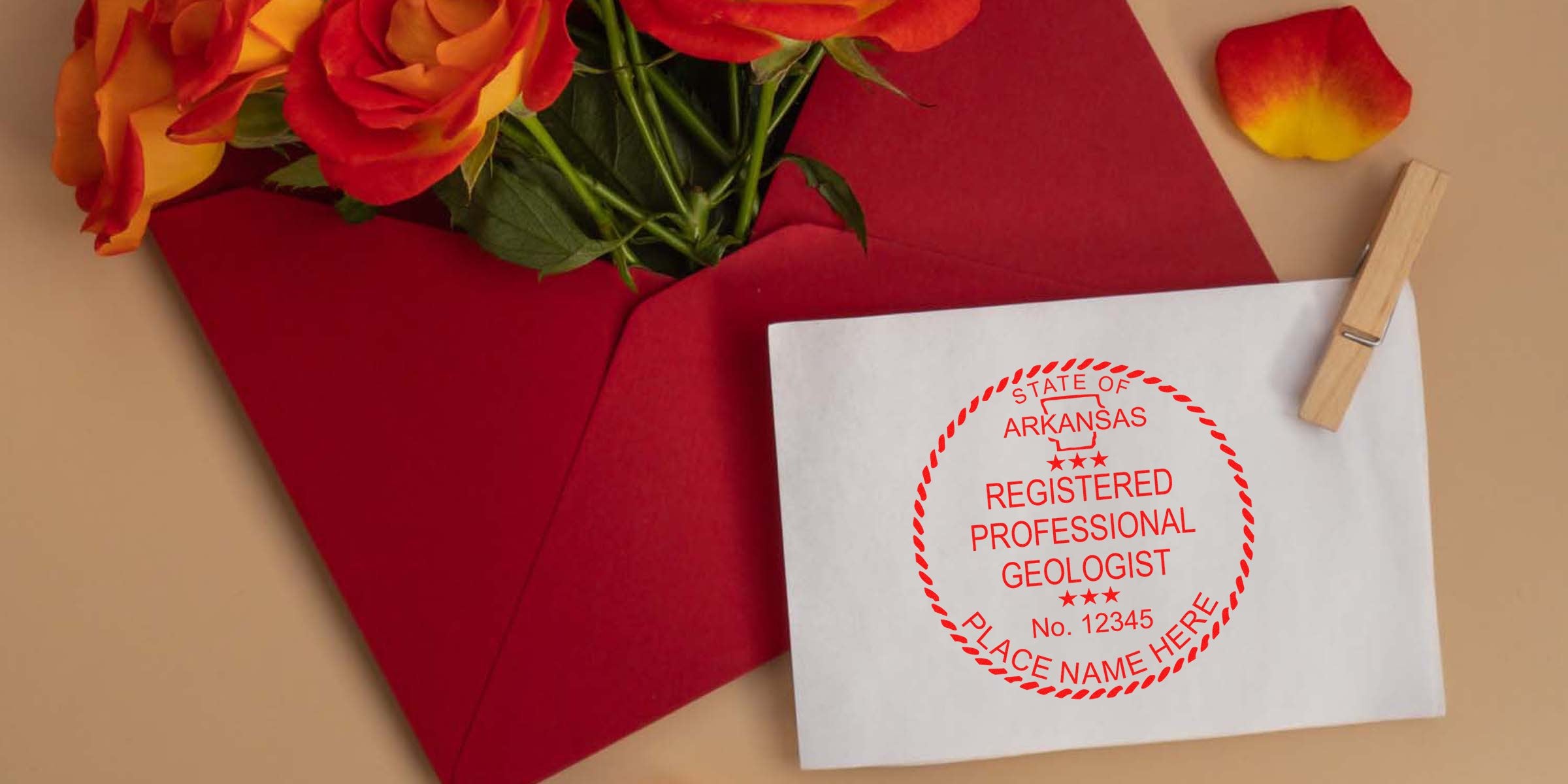 Red envelope with orange roses and white card, featuring Arkansas geologist stamp and registered professional geologist seal, perfect for geologist stamp orders.