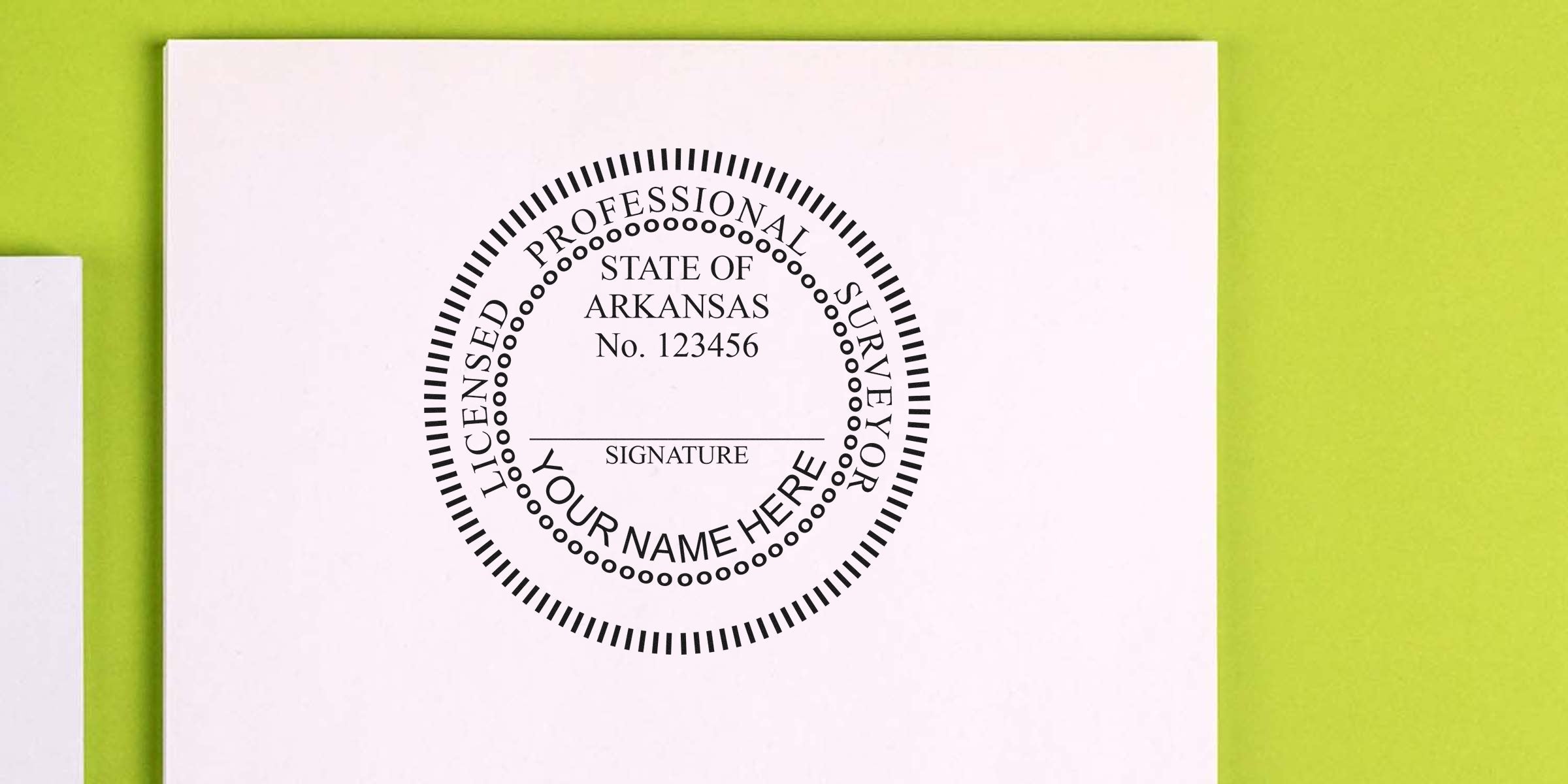 Arkansas land surveyor seal embossed on white paper with licensed professional surveyor stamp and embosser.