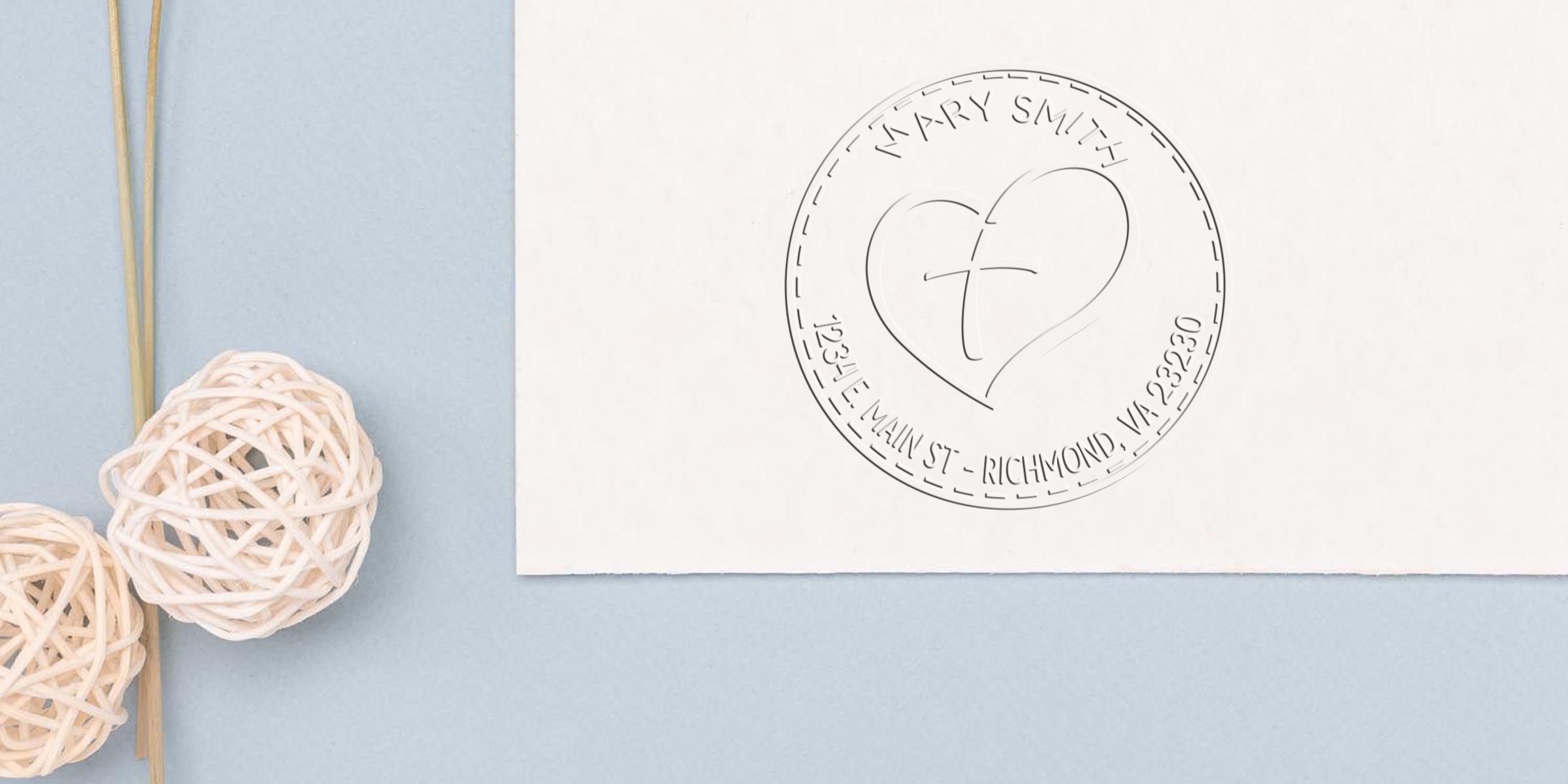 Elegant white memorial stationery featuring a heart-and-cross monogram with Mary Smith embossed seal on a soft blue background with decorative wicker accents