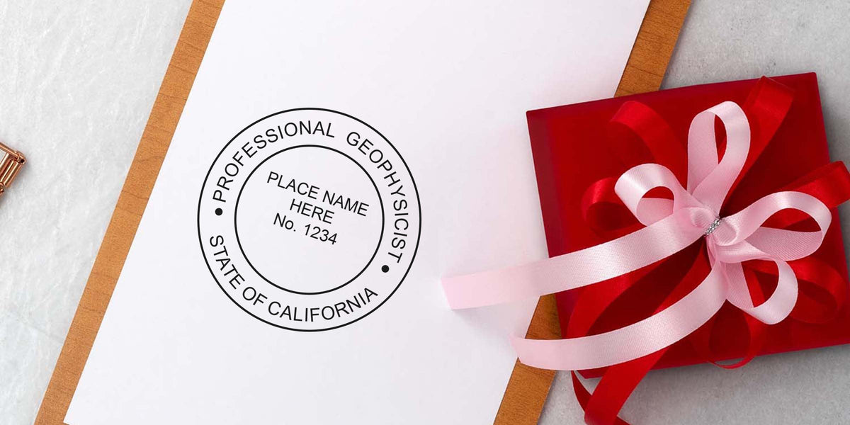 California Geologist Stamp seal on white paper next to a red gift box with a pink ribbon, following Geologist Stamp Guidelines.