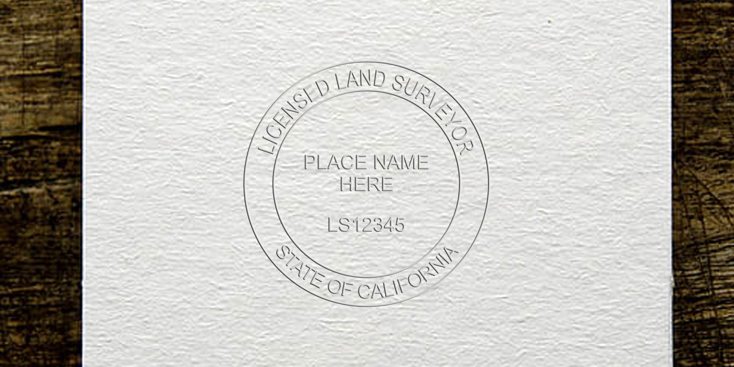 California land surveyor embossed seal on textured paper with wooden background, meeting official stamp requirements.