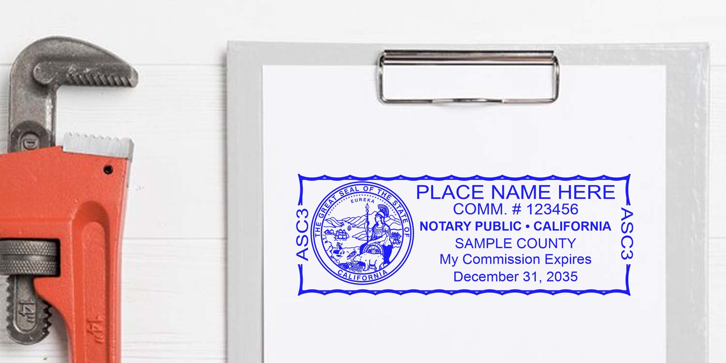 California notary stamp on clipboard shows commission details and seal expiration, placed next to a red pipe wrench, highlighting California notary seal renewal.