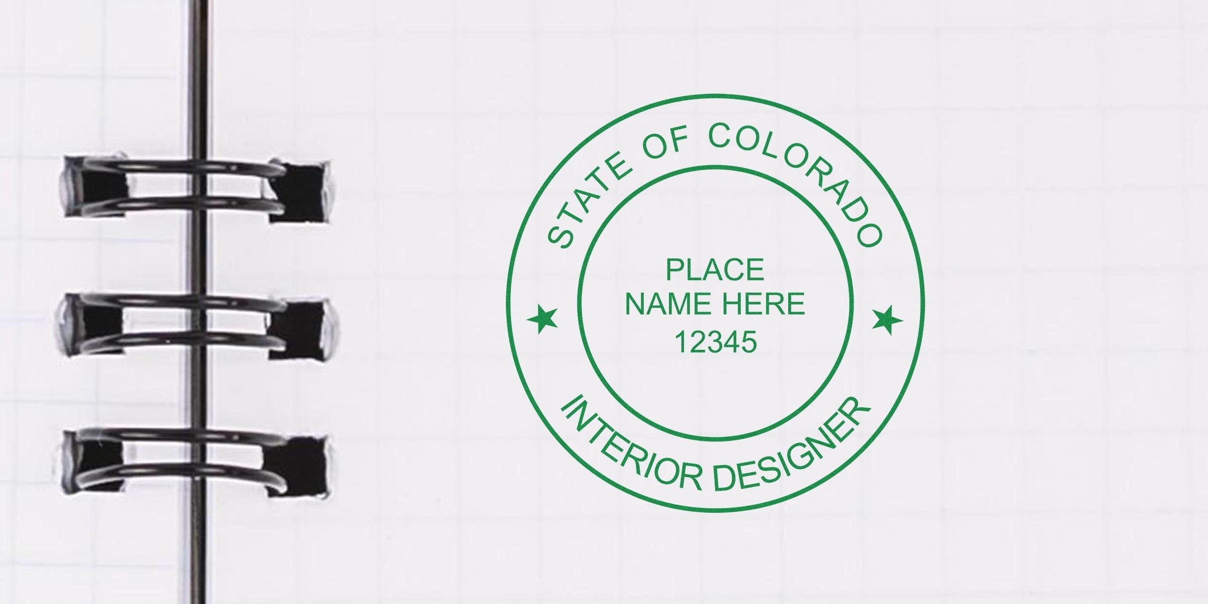 Spiral notebook page with a Colorado interior designer stamp, showcasing interior design licensing in Colorado.