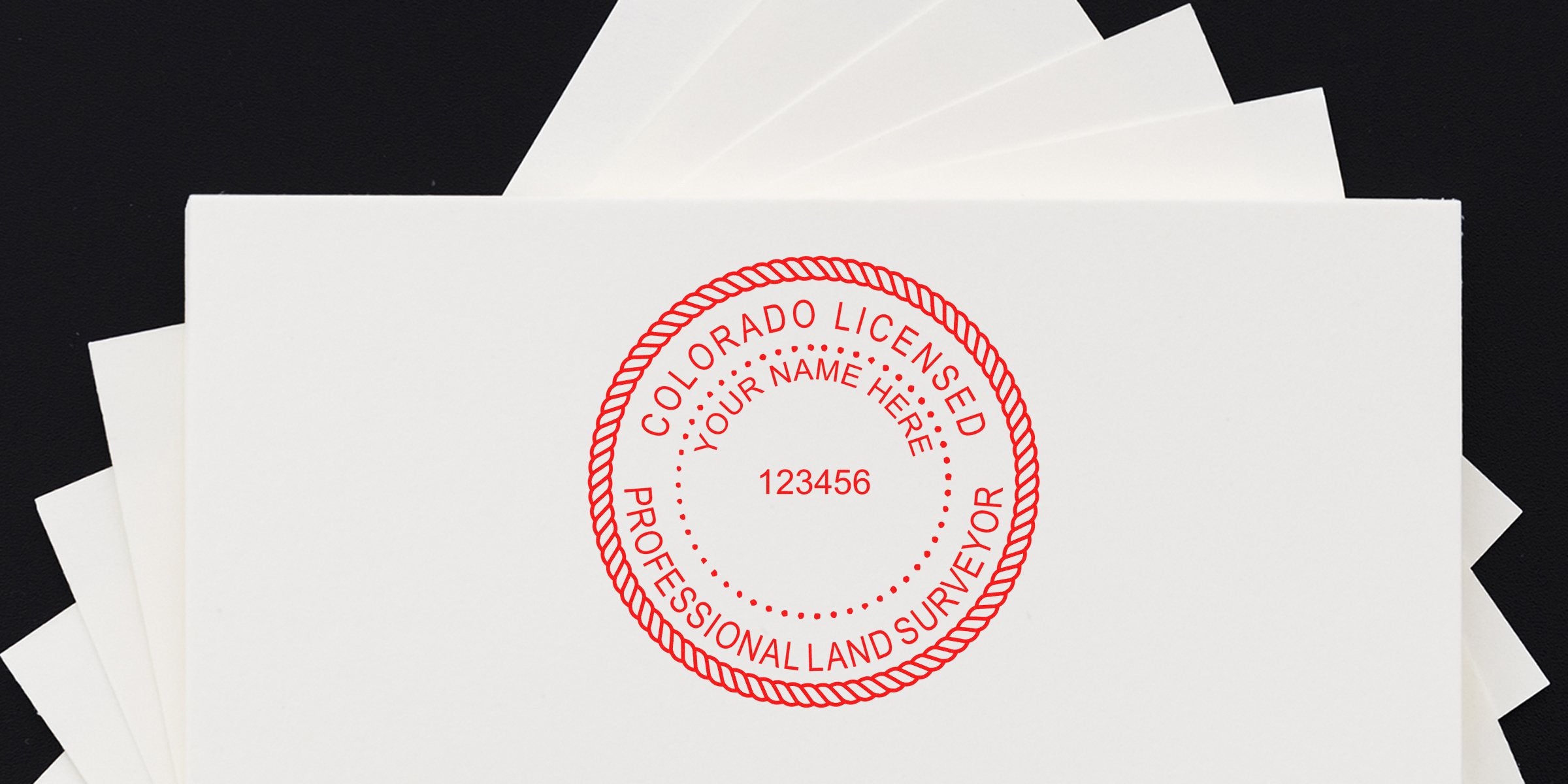 Colorado land surveyor seal on white paper, symbolizing a licensed professional providing land surveying services.