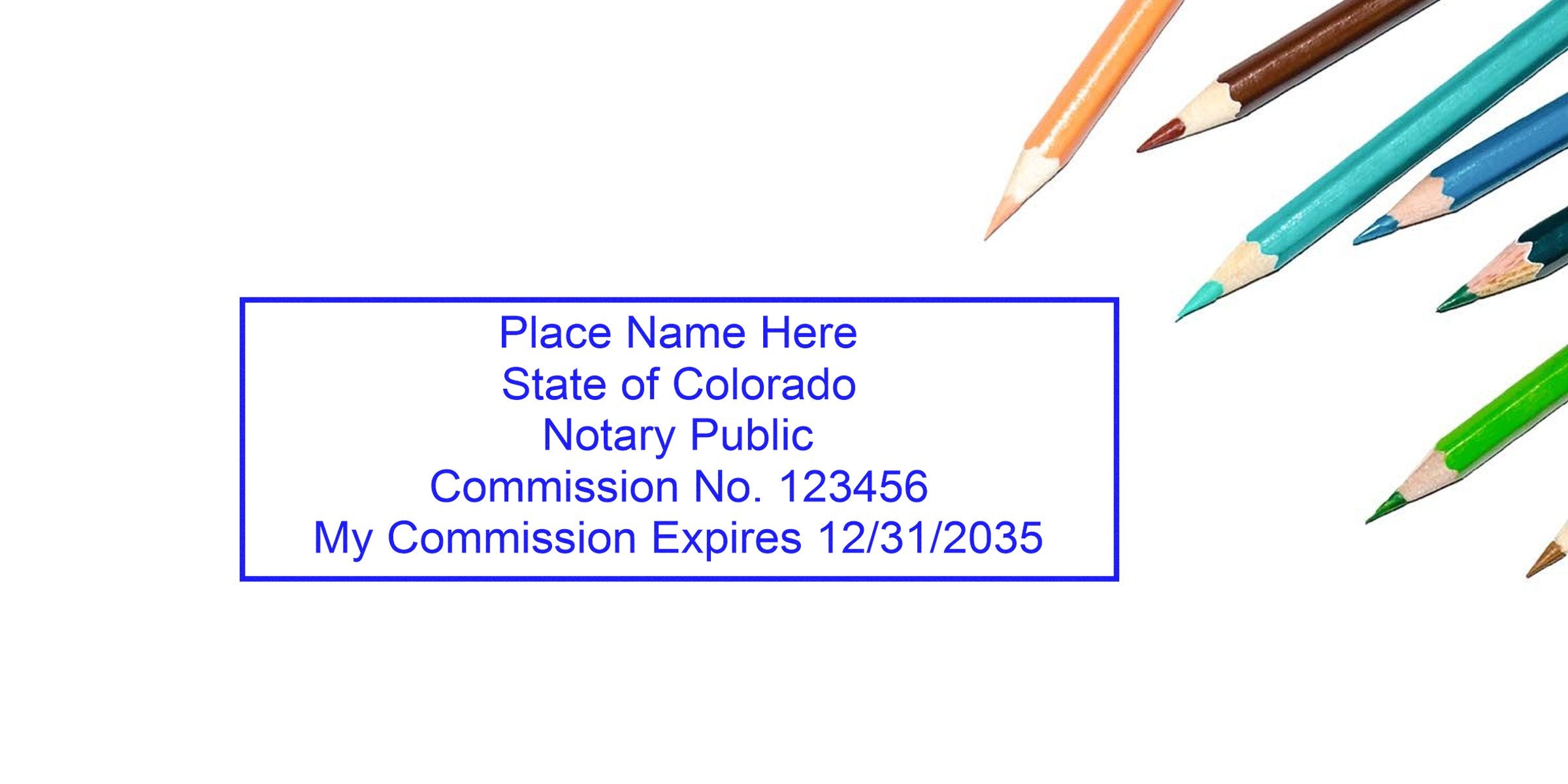 Colorado notary stamp with commission number and expiration date next to colored pencils, perfect for a notary stamp buying guide.