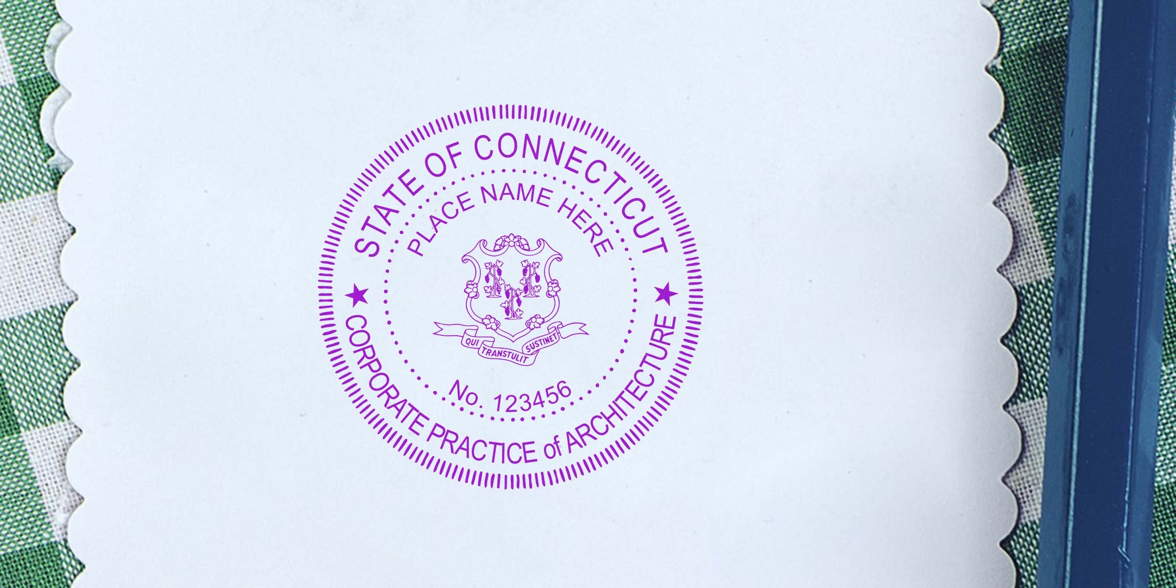 Connecticut architect seal embosser imprint on white paper, highlighting a trusted tool for corporate architecture certification.