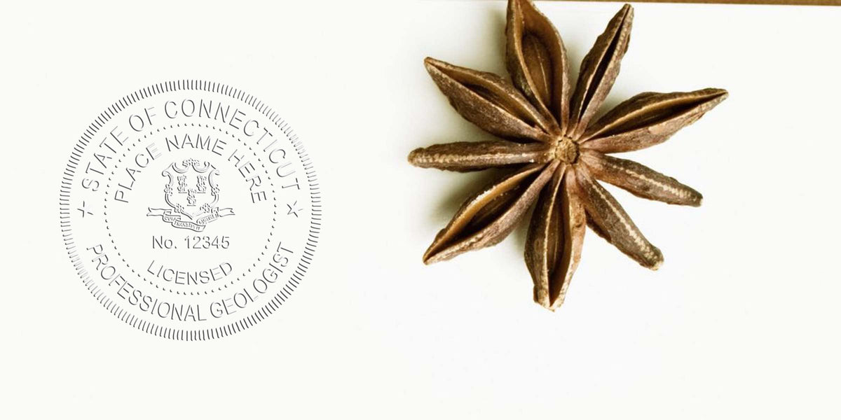 Close-up of star anise next to a licensed Connecticut geologist seal, highlighting CT geologist license and stamp renewal.