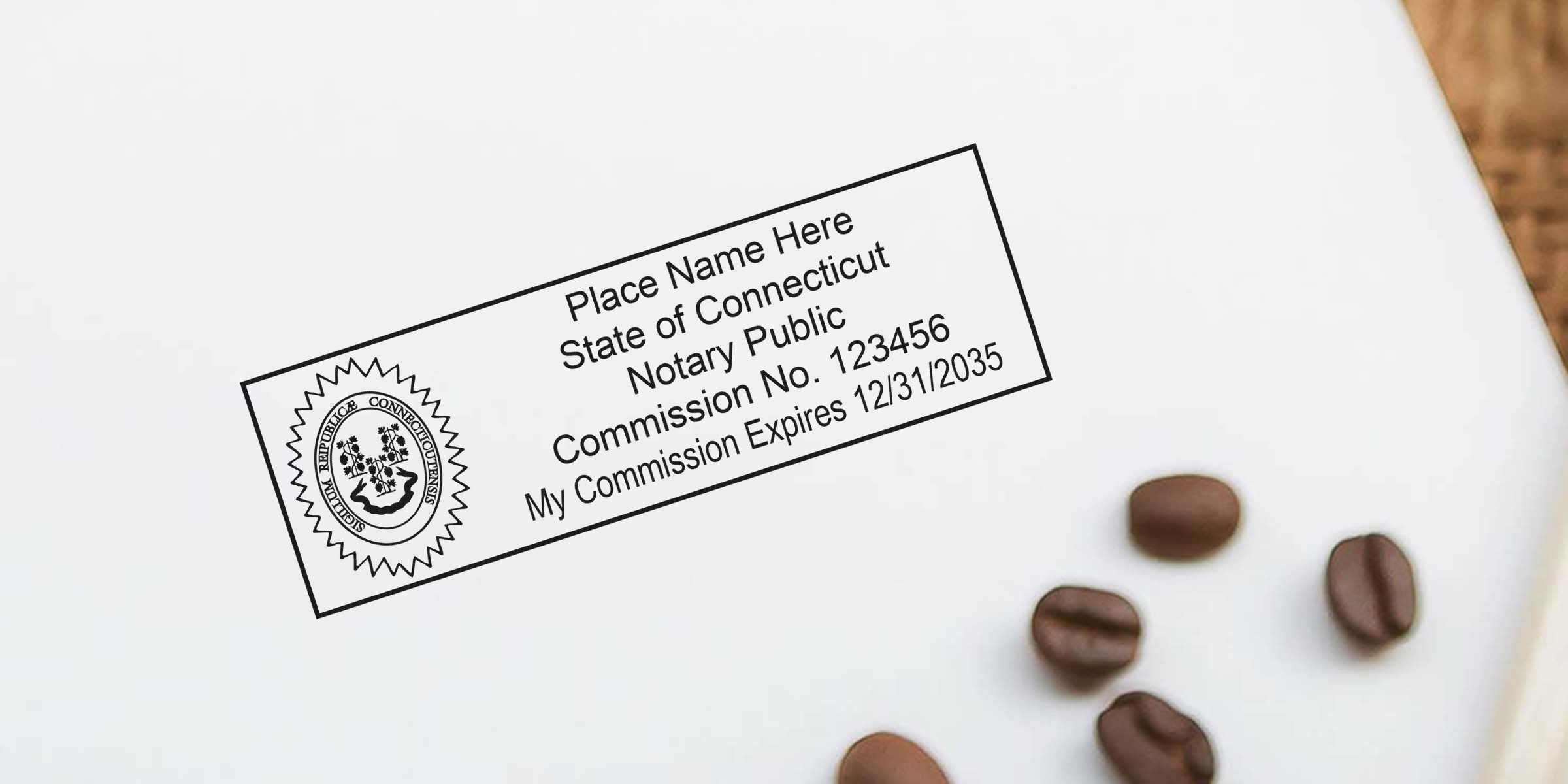 Connecticut Notary Seal stamp with commission number and expiration date on white paper, surrounded by coffee beans, emphasizing Connecticut Notary Requirements.