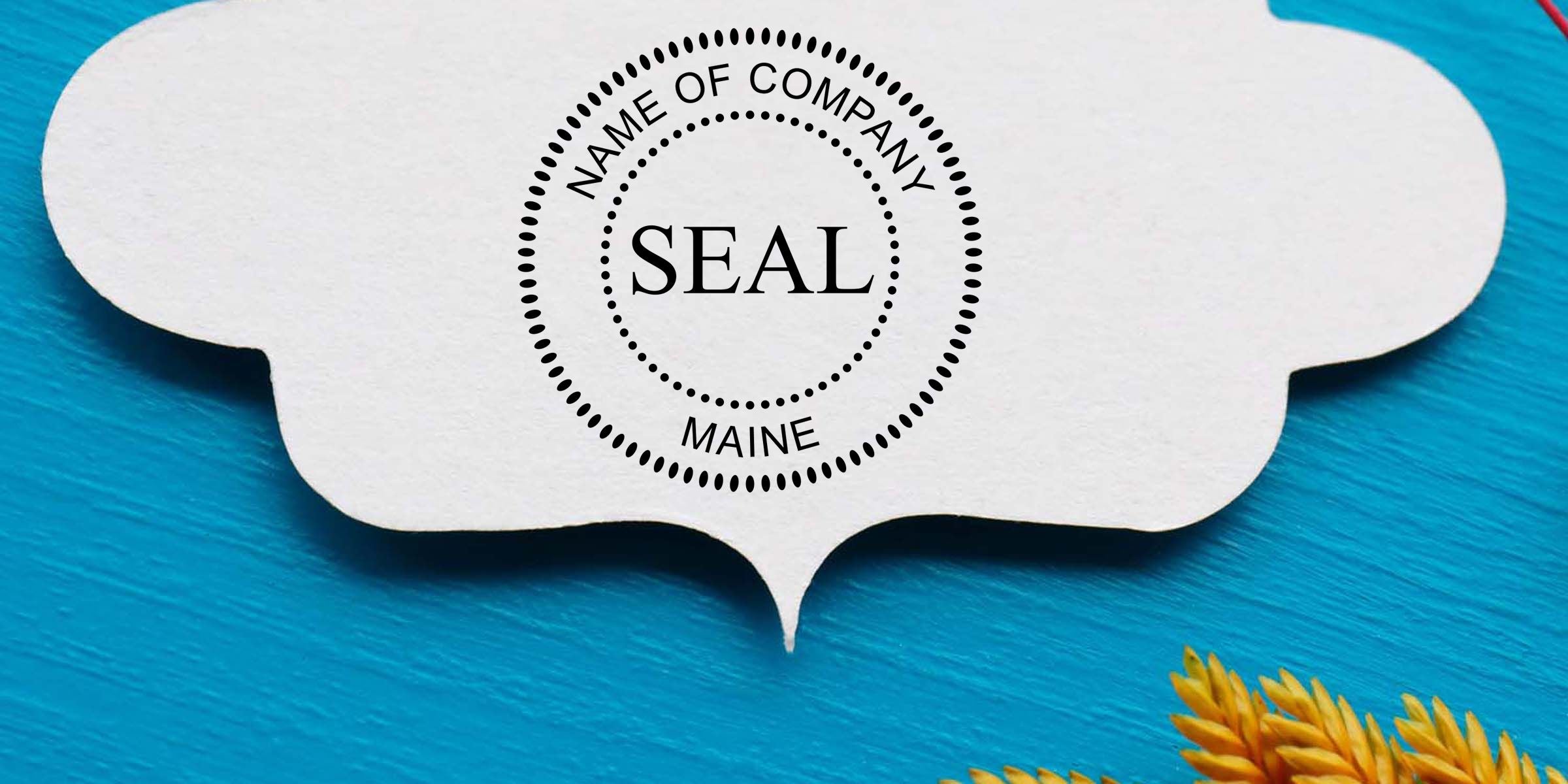 White company seal template with “NAME OF COMPANY” and “MAINE” text on a blue textured background with yellow flowers in the corner