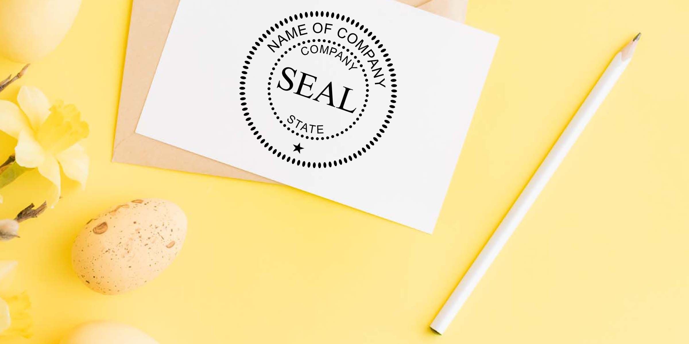 Custom company seal stamp on white stationery with a white pencil, yellow floral decor, and a speckled egg on a bright yellow background
