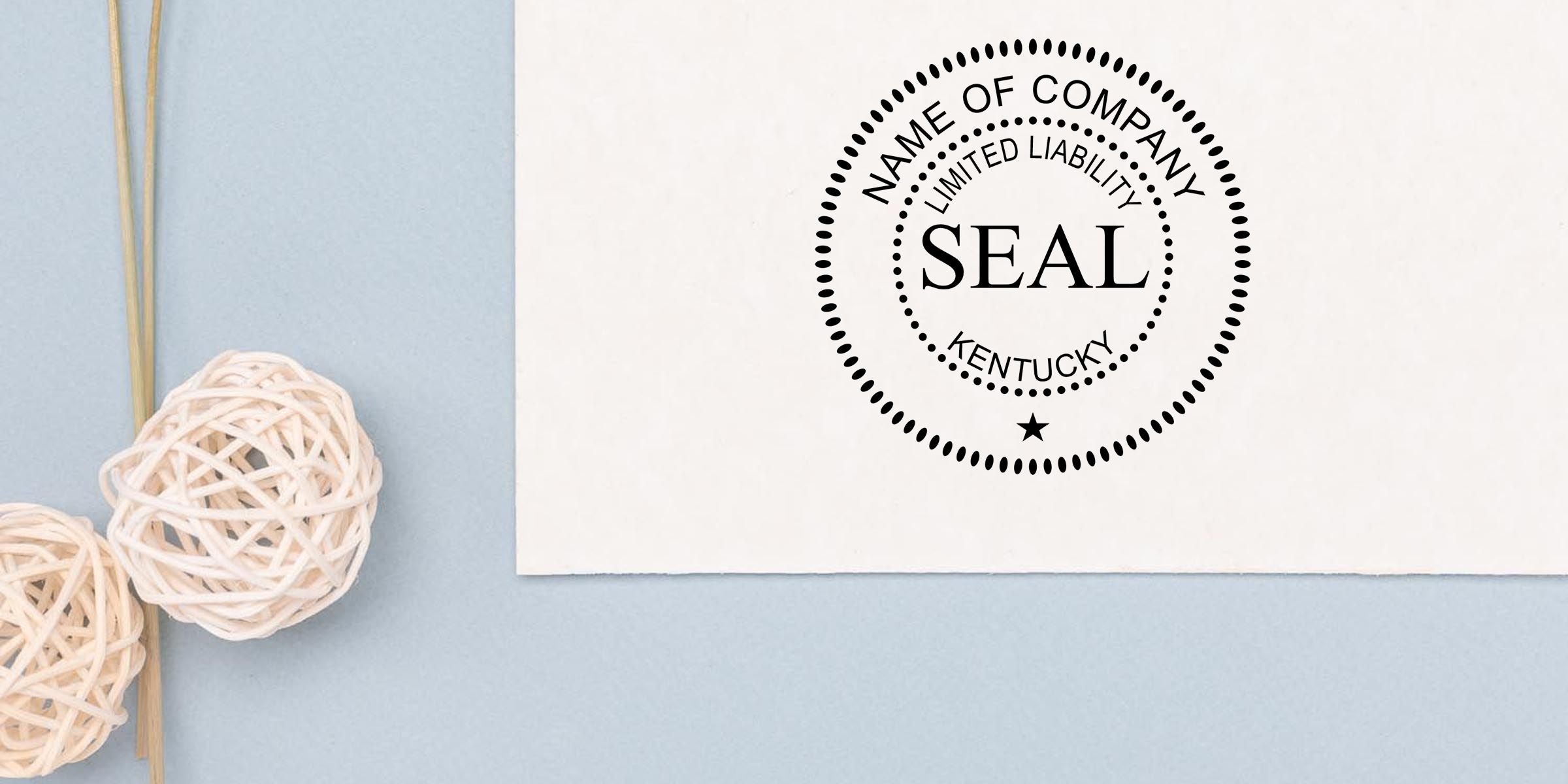 Kentucky limited liability company seal stamp on white document with decorative wicker balls on a light blue background
