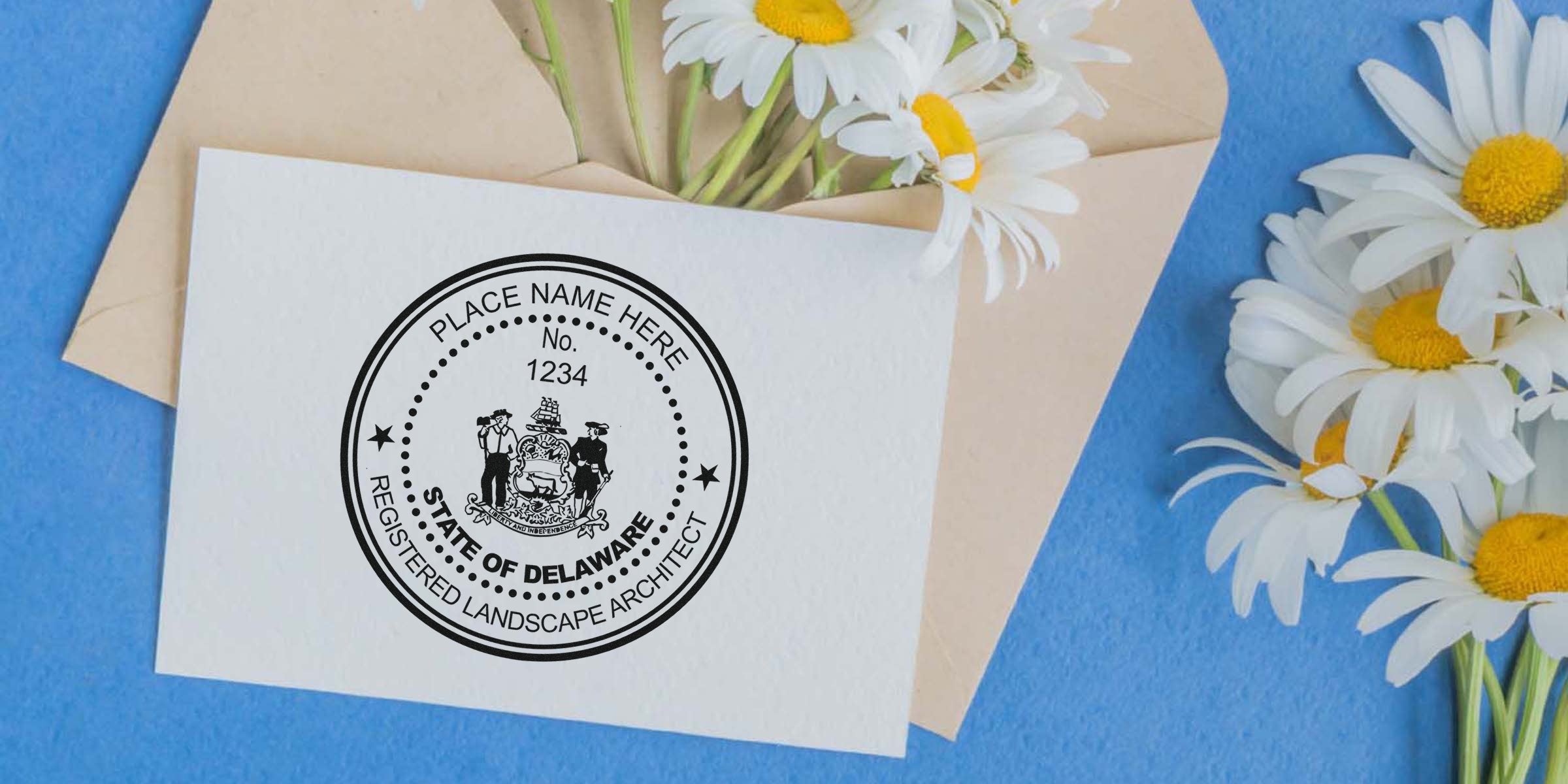 Delaware landscape architect license seal on white card with daisies and envelope, set on blue background, complying with Delaware landscape architect stamp regulations.