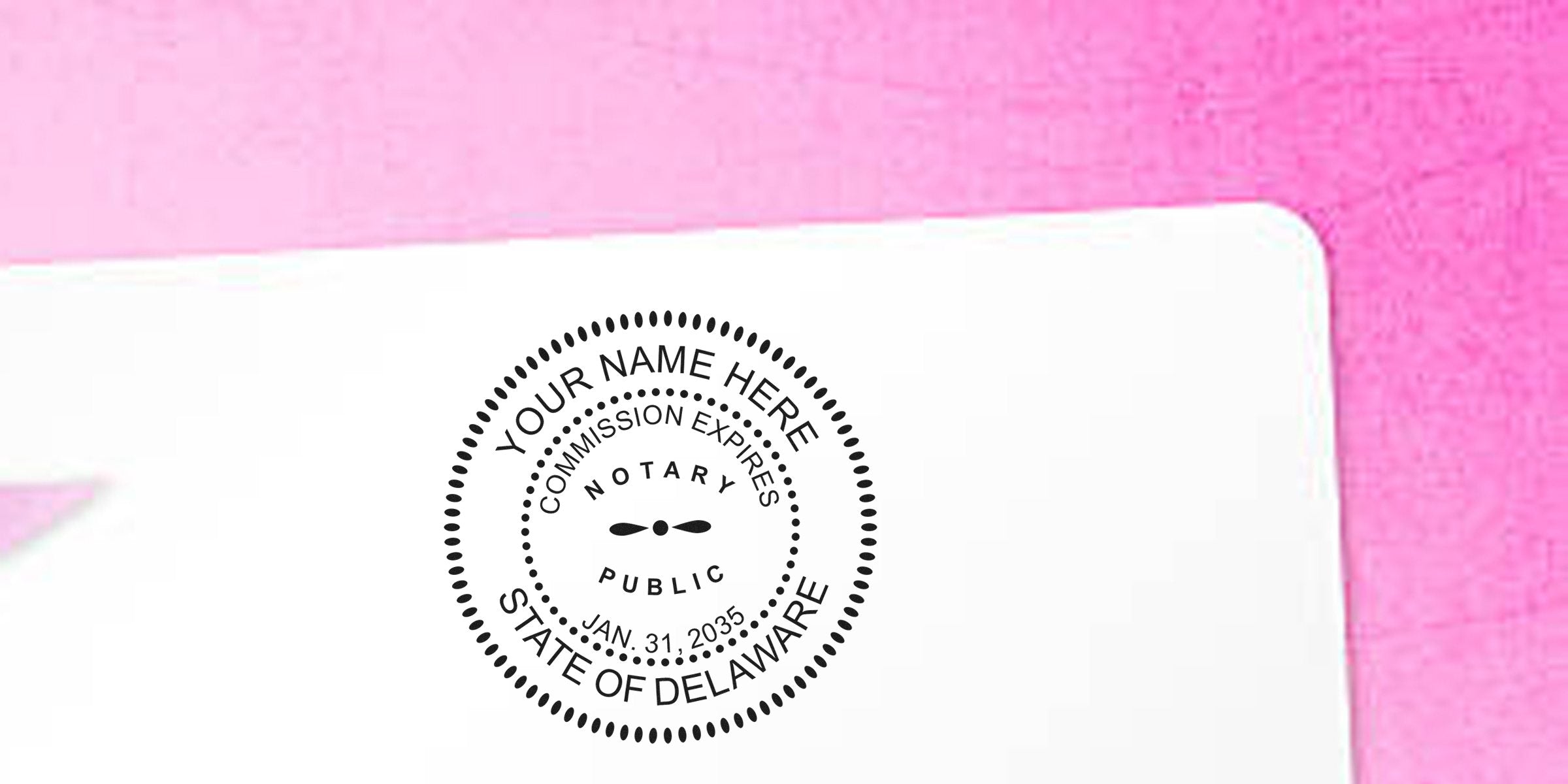 Delaware notary seal stamp on white paper with pink background displaying the seal’s expiration date.