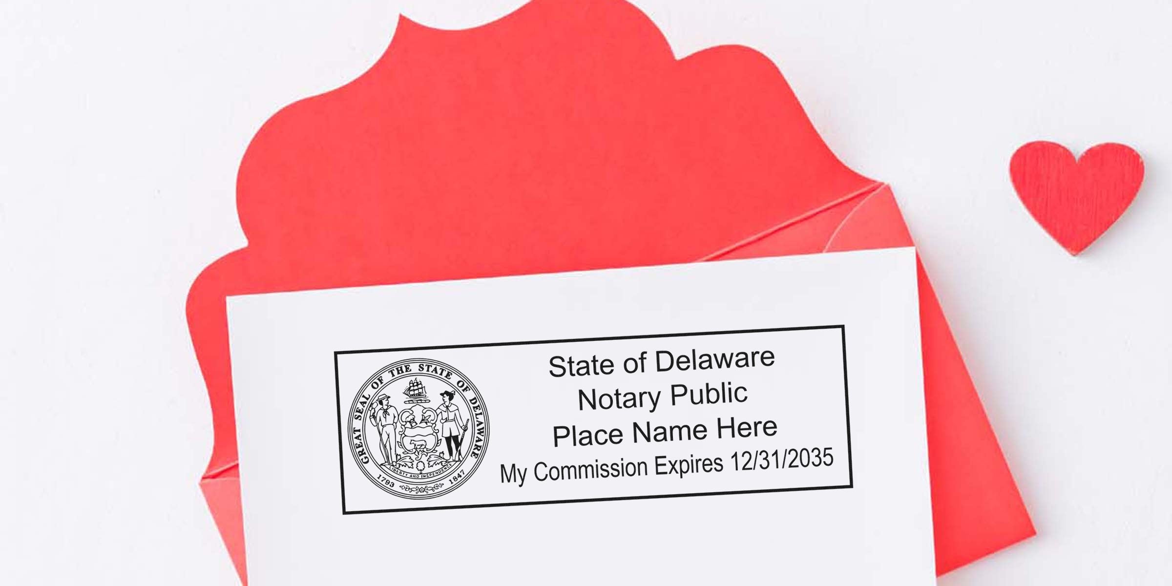 Delaware notary stamp on white paper with red envelope and heart, showing a trusted notary seal and commission expiration date.