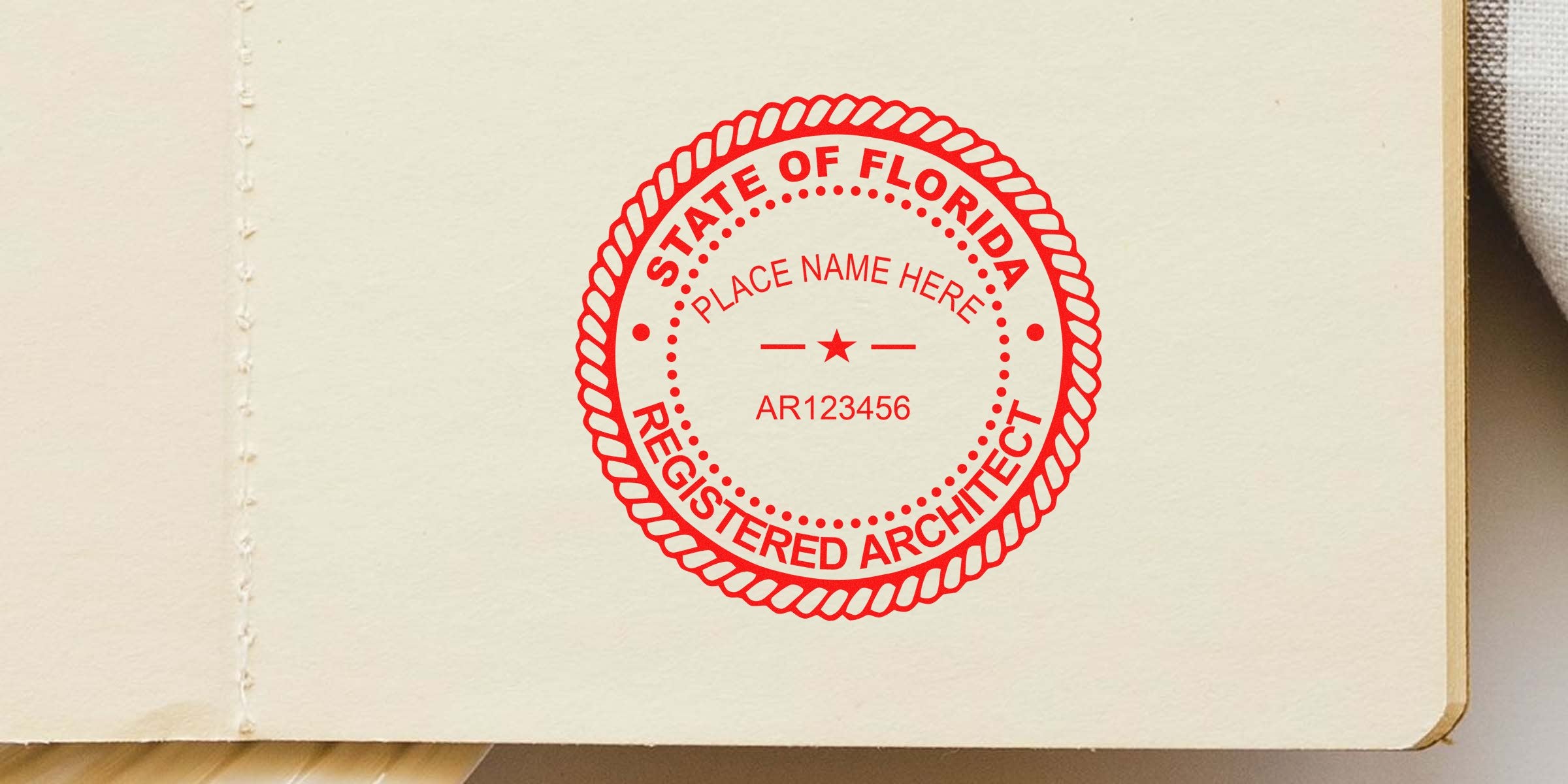 Florida architect red seal stamp on paper for license verification and stamp application.
