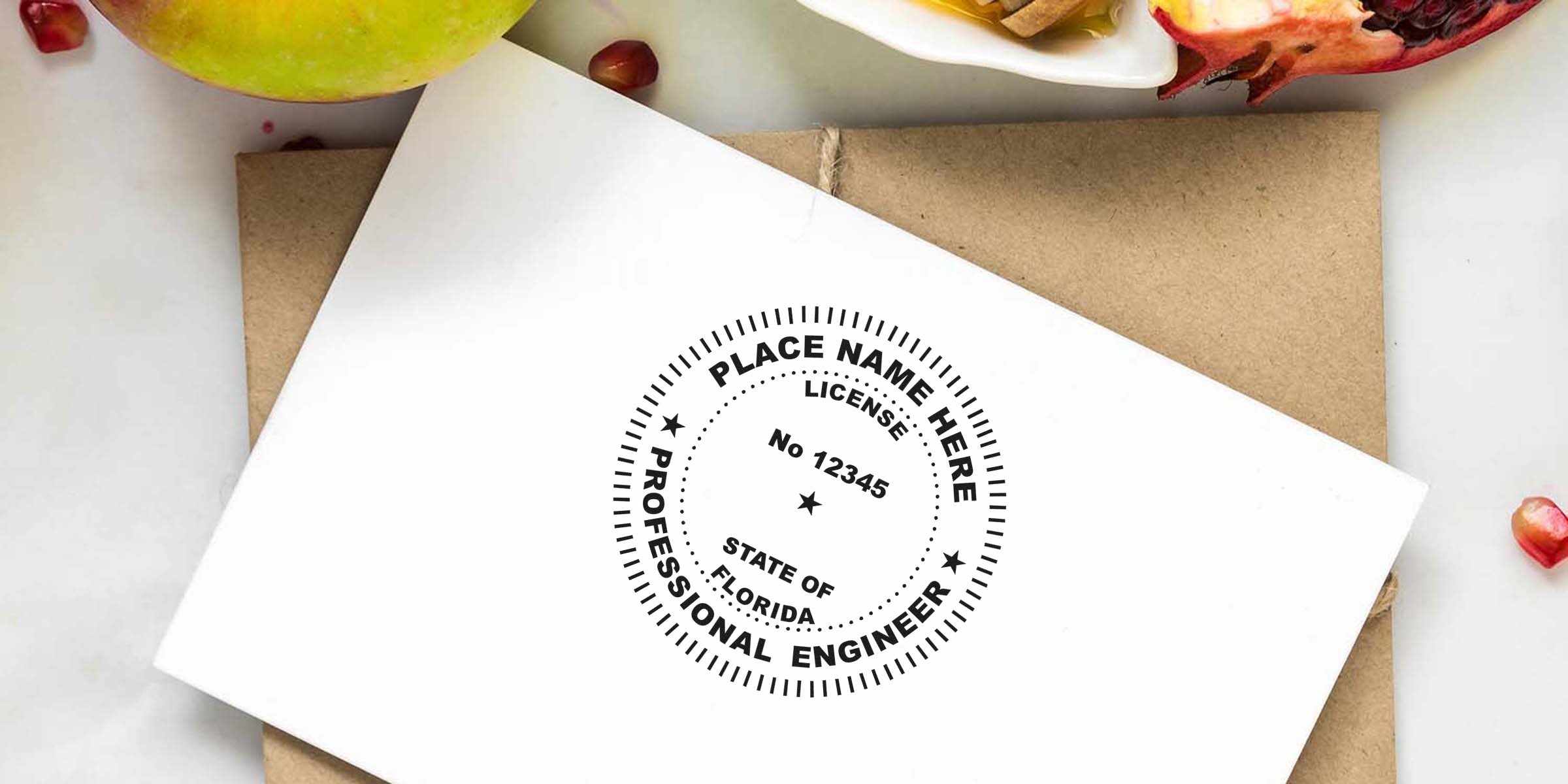 Florida professional engineer license stamp on white envelope with pomegranate and apple background, highlighting Florida Engineer Stamp cost and price details.