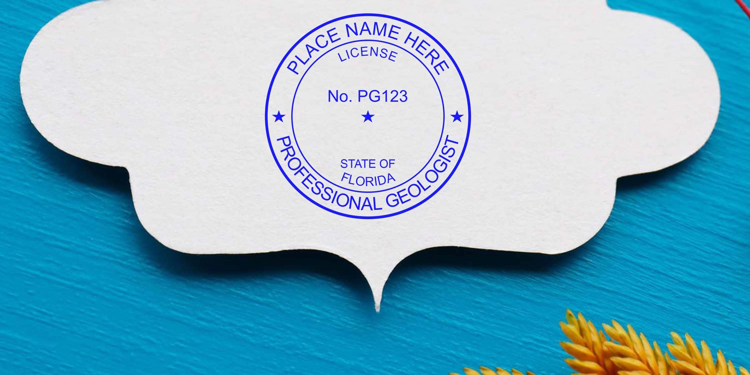 Florida Geologist Stamp Renewal with a professional license stamp on white paper, blue background, yellow plant, and Florida Certified Geologist seal for license renewal.