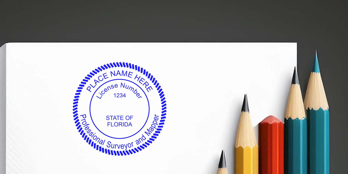 Florida land surveyor seal on white paper with colorful pencils, showing surveyor seal details for professional surveyor and mapper license.
