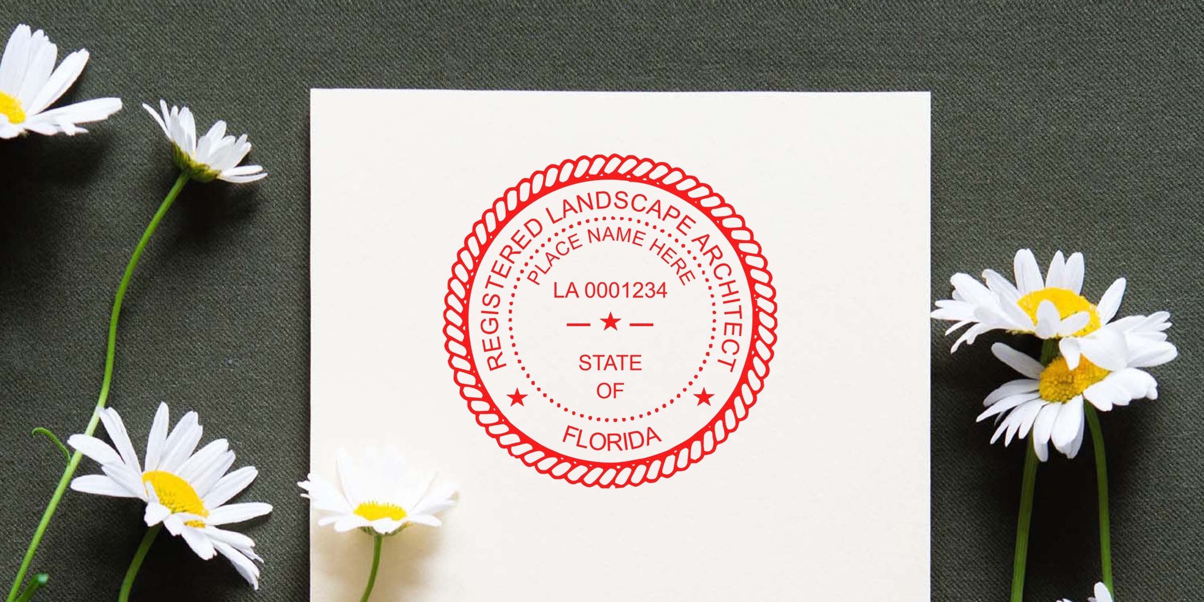 Florida landscape architect license seal on white paper with daisies, showing registered landscape architect stamp meeting all stamp requirements.