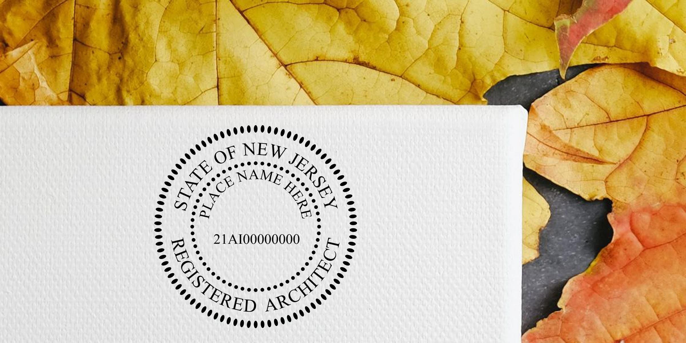 State of New Jersey registered architect stamp on white textured paper with autumn leaves background and placeholder name area