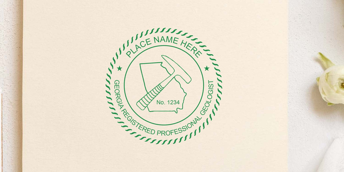 Georgia Geologist Stamp with registered professional geologist seal, geological hammer, and state outline on beige paper, meeting Professional Stamp Requirement.