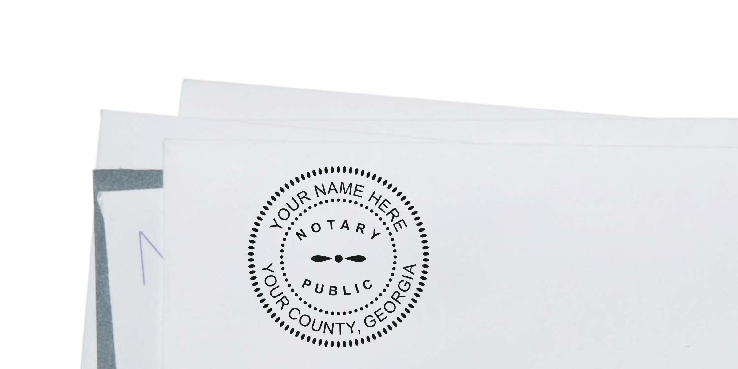 Custom Georgia notary public stamp on white envelope meets all notary seal requirements.