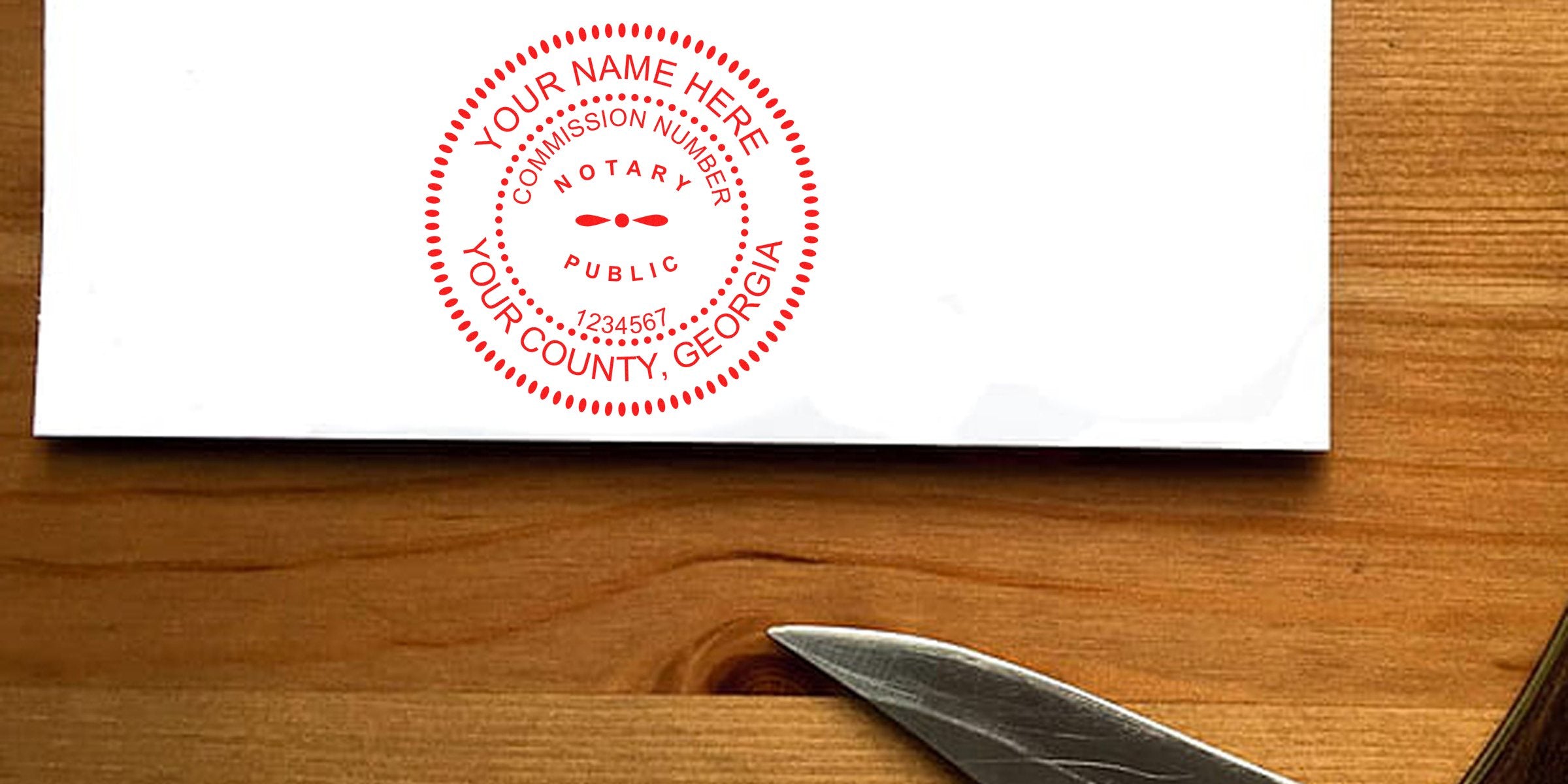 Custom Georgia notary stamp on white paper with wooden background, personalized with official commission number, designed to meet Georgia notary public requirements.