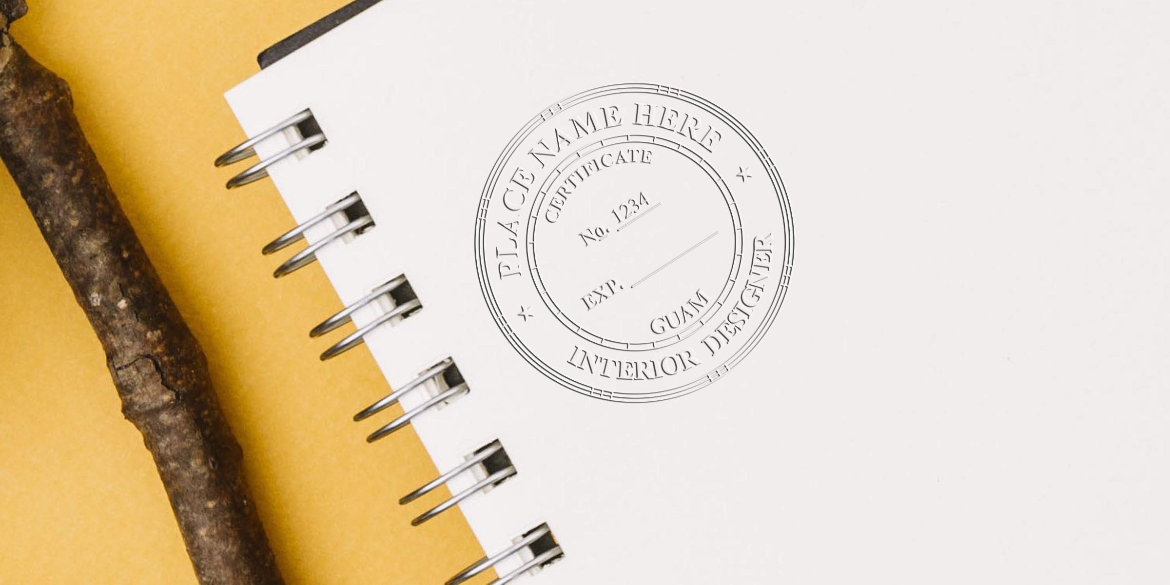 Spiral notebook with a custom Interior Designer Stamp Guam on a yellow background, showcasing Guam Interior Design Requirements.