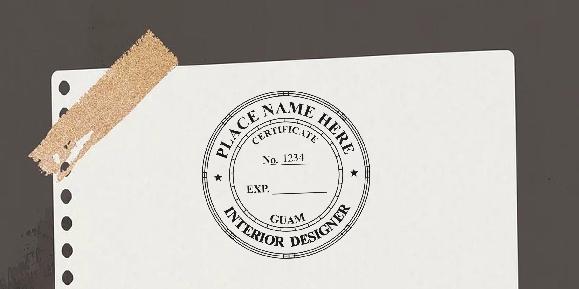 Interior designer certification stamp on white paper with tape, meeting Guam interior design regulations and stamp requirements.