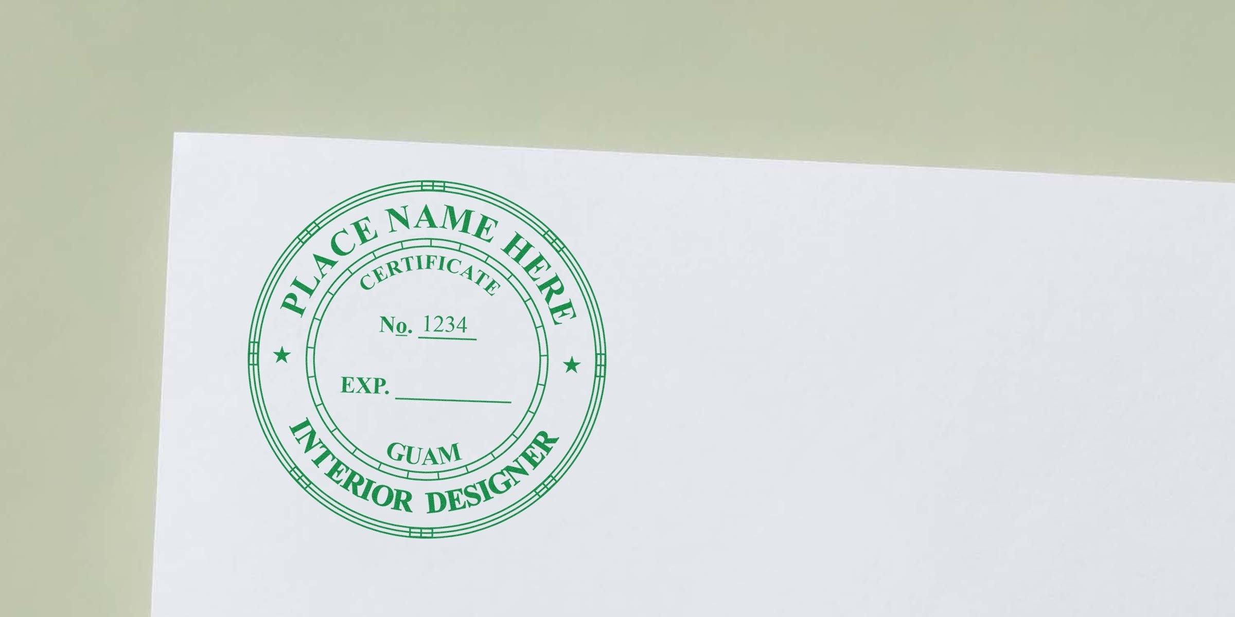 Green interior designer stamp on white paper showcasing the benefits of Guam interior designers.