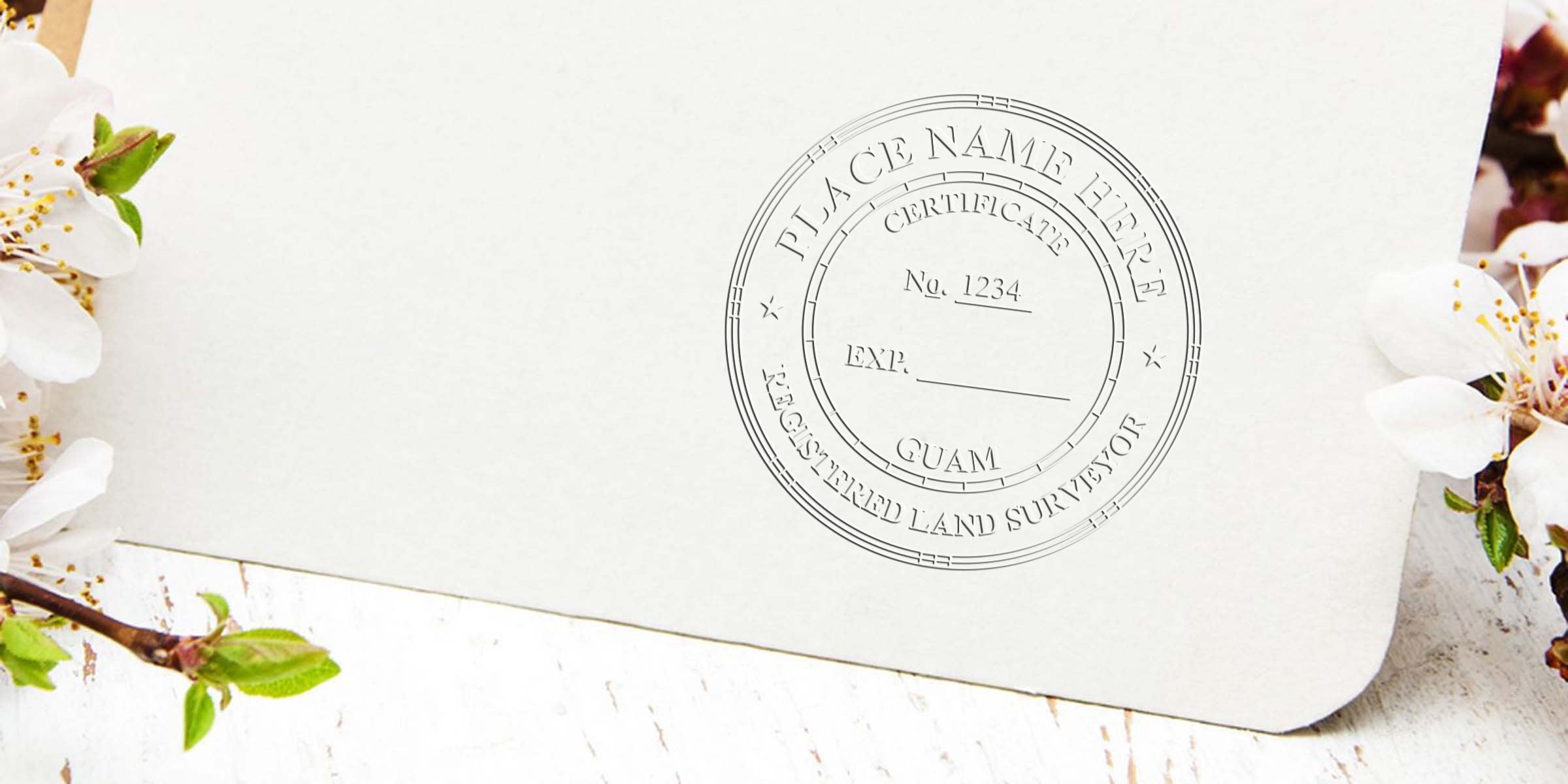 Guam land surveyor stamp on registered certificate paper, set against spring flowers and a wooden table, emphasizing the stamp's validity.