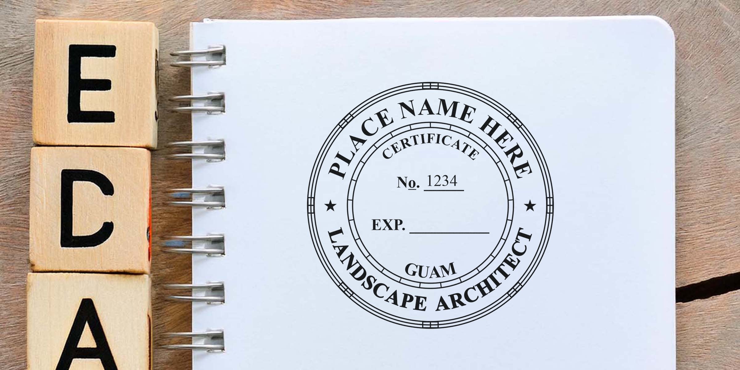 Wooden EDAA blocks next to a spiral notebook with a custom Guam landscape architect seal design, plus a guide for purchasing landscape architect seals.