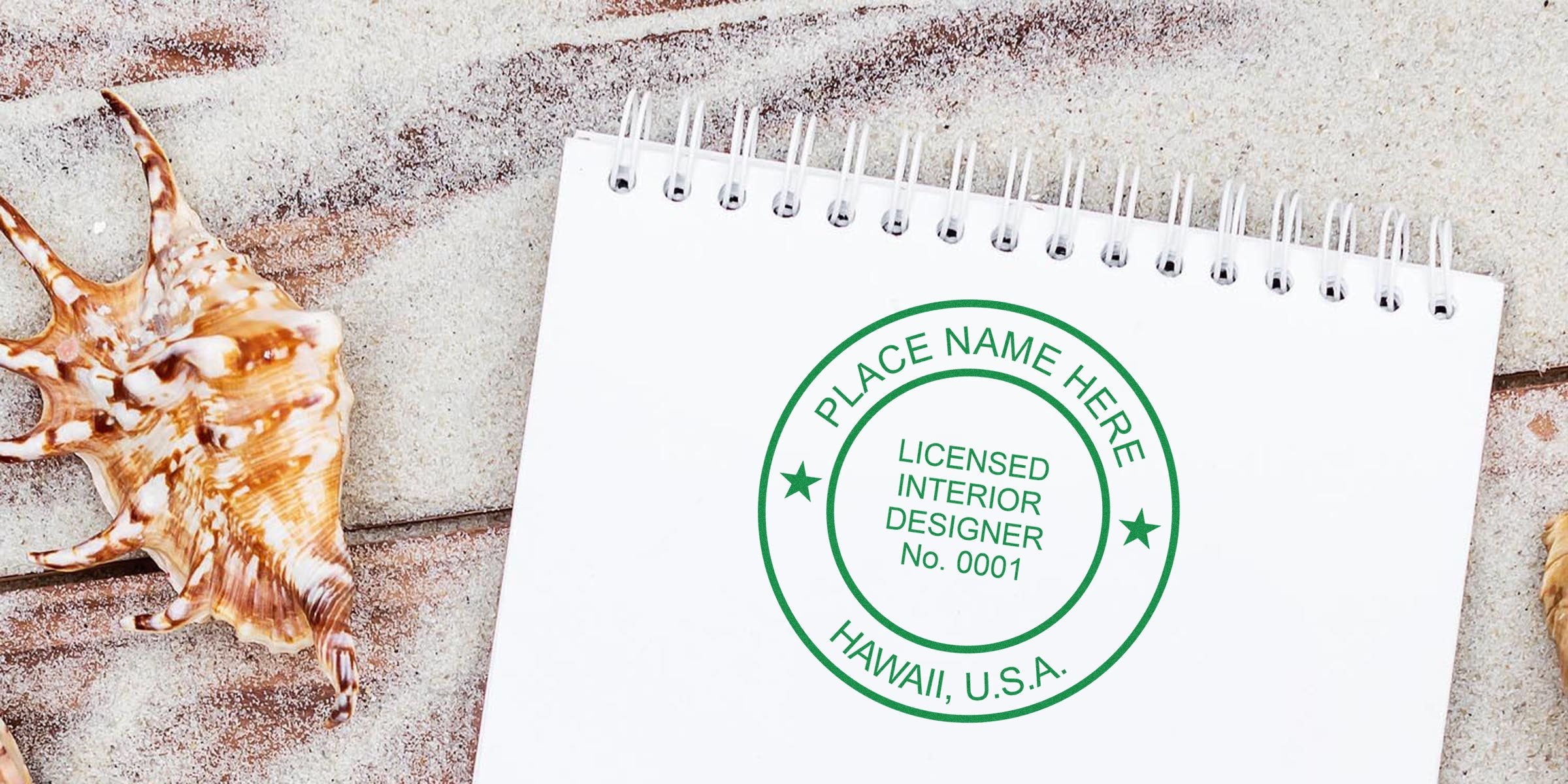 Hawaii interior designer stamp on notebook with seashells on wooden beach table, USA, symbolizing the interior designer application process.