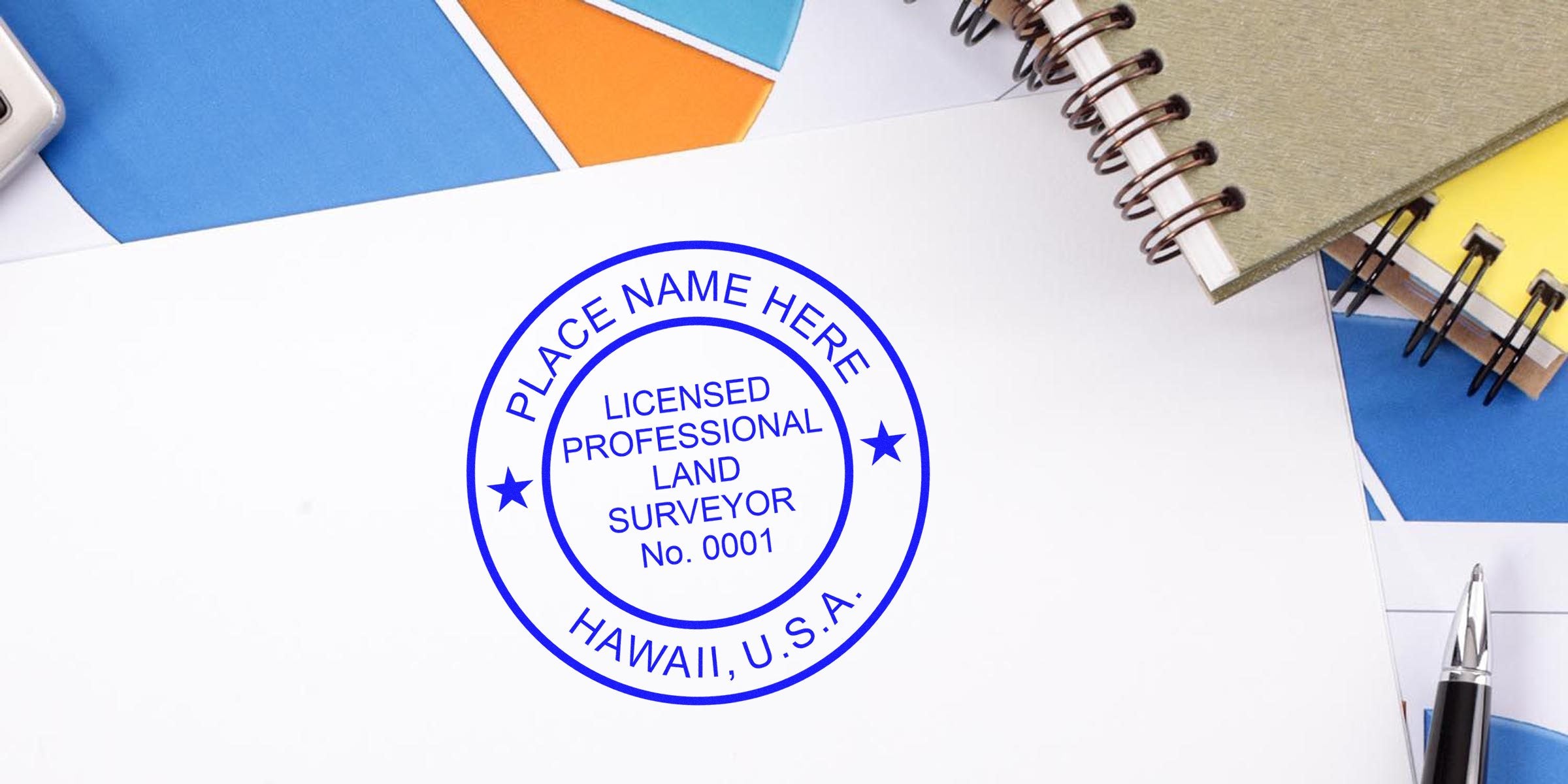 Licensed professional land surveyor stamp on white paper with Hawaii seal and certification, surrounded by office supplies and notebooks.