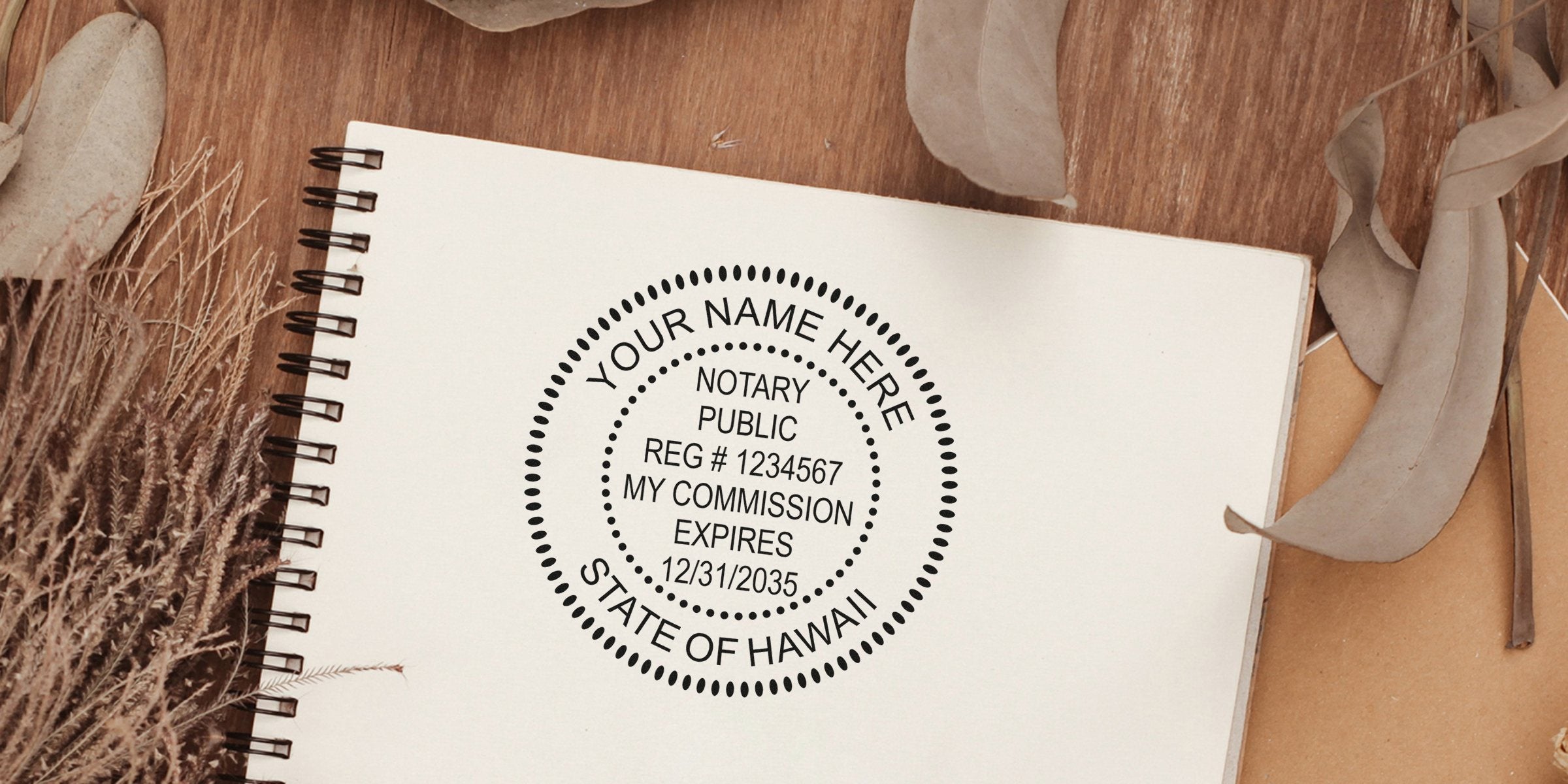 Custom Hawaii notary stamp design on spiral notebook showing commission expiration date, Hawaii notary seal size, and seal dimensions.