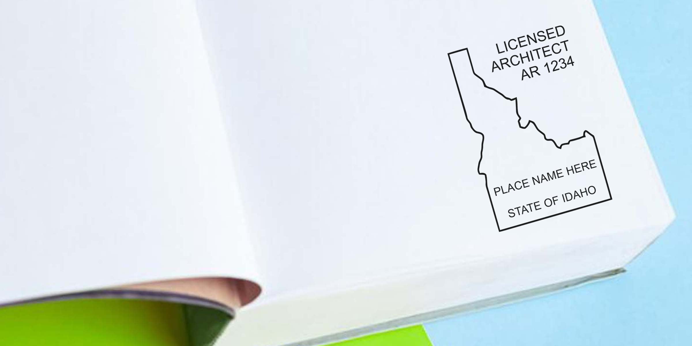 Idaho architect seal embosser imprint on white paper, confirming valid architectural design approval and authentic architect seal purchase.
