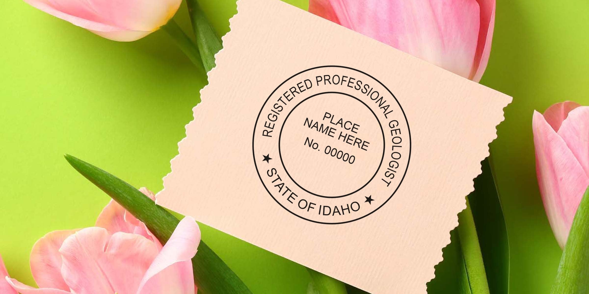 Registered professional geologist certification stamp on paper with Idaho geologist stamp and specifications, alongside pink tulips and a green background.