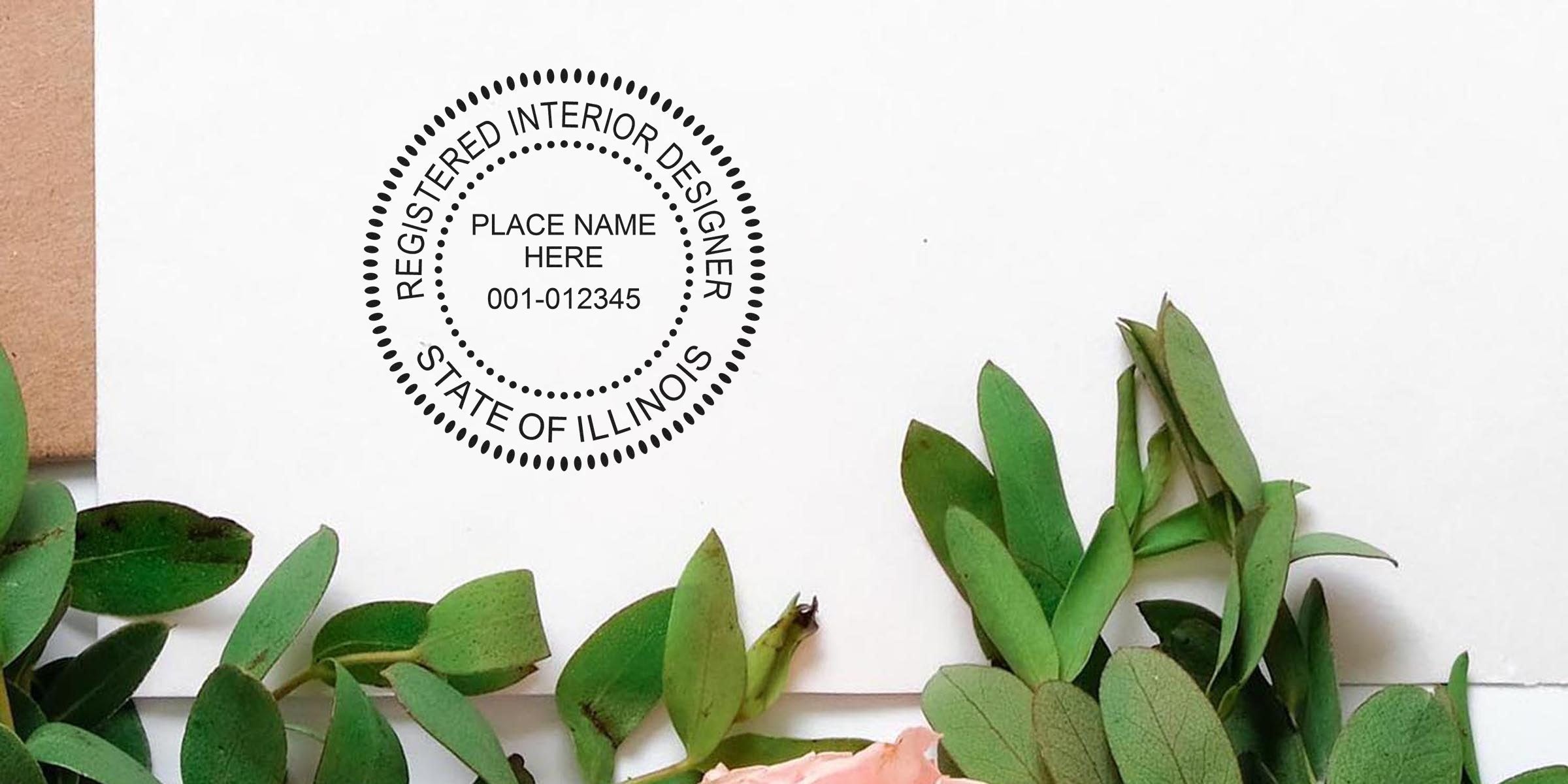 Illinois interior designer seal on white paper with green leaves and a pink flower, symbolizing Illinois interior design certification.
