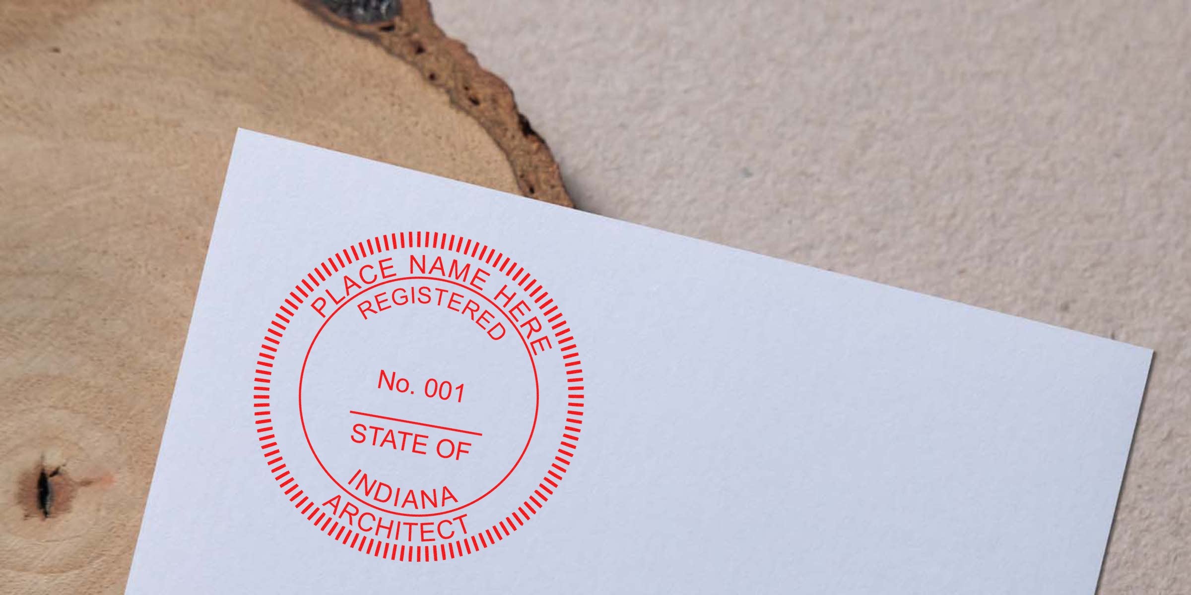 Close-up of a registered Indiana architect stamp on white paper showing the Indiana architect seal and digital architect seal.