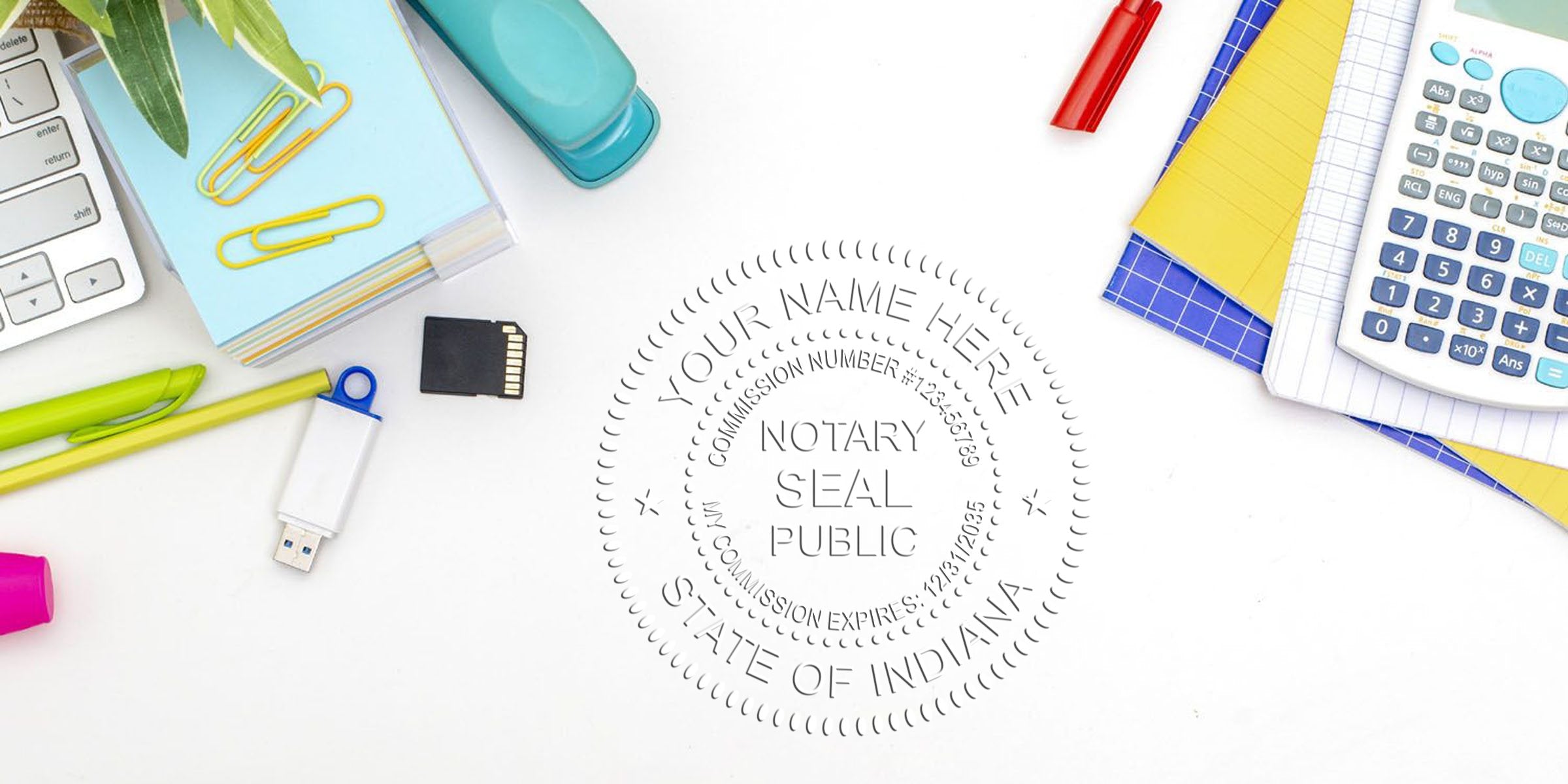 Indiana notary seal with calculator, USB drive, paper clips, and pens on white desk, showing how to become a notary in Indiana.